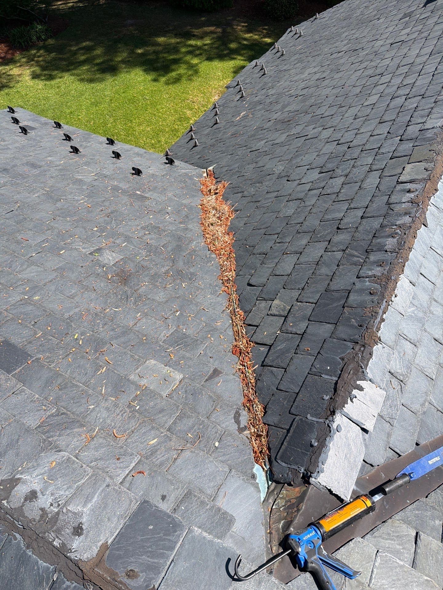 Historical Slate Roof Repair and Chimney Flashing Restoration in West Point by Cade Construction