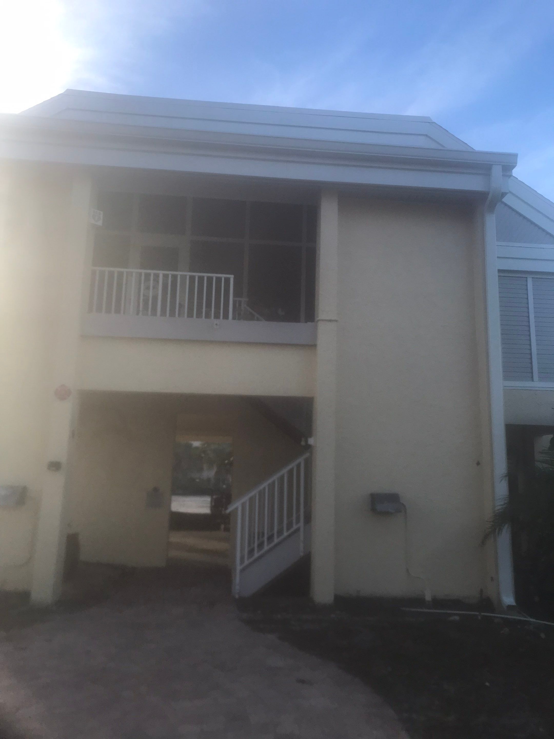 K-Style Seamless Gutter Installation using White Seamless Gutters in Sanibel FL by Gutter Professors