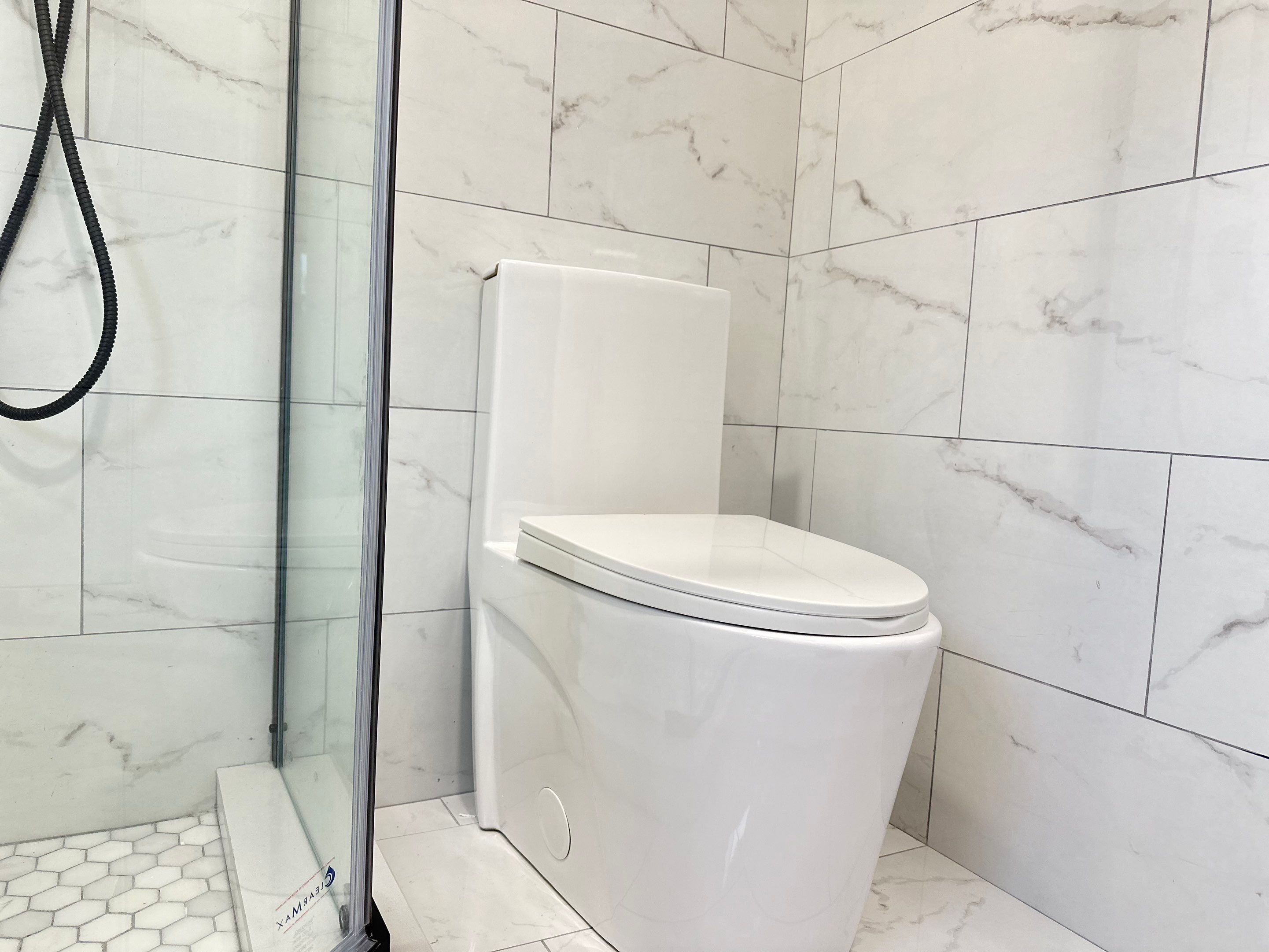 Bathroom Remodel using Tile by Home Concepts Construction