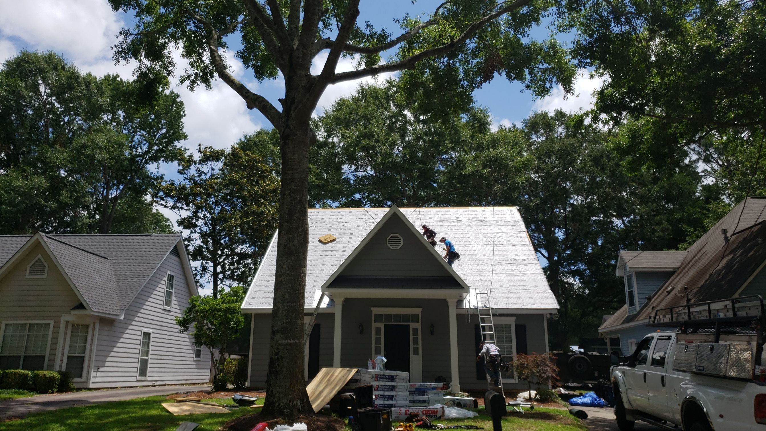 Residential Roofing Installation using Roof Replacement by American Roofing & Construction LLC