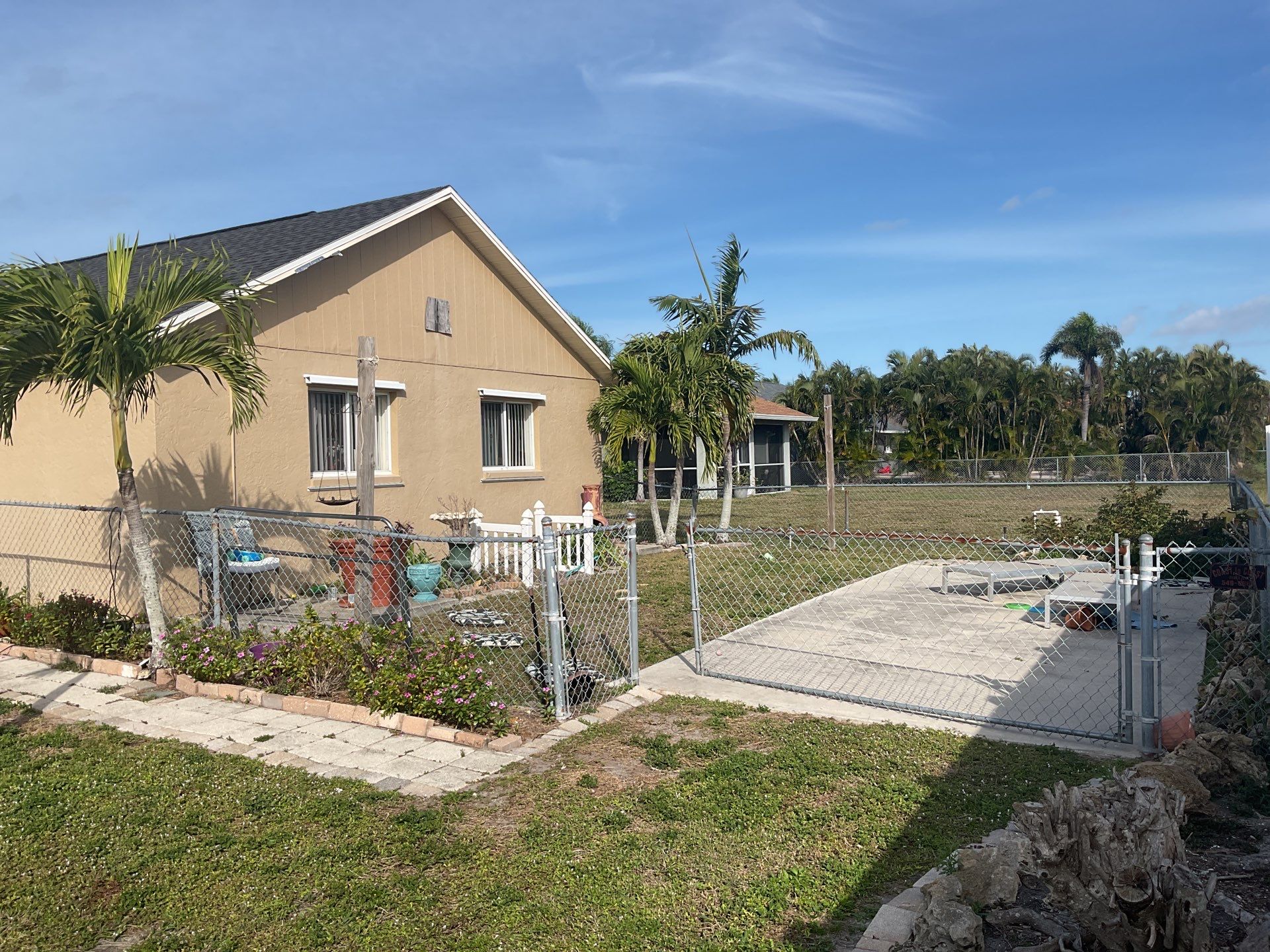 Black Seamless Gutters for Modern Cape Coral Homes by Gutter Professors