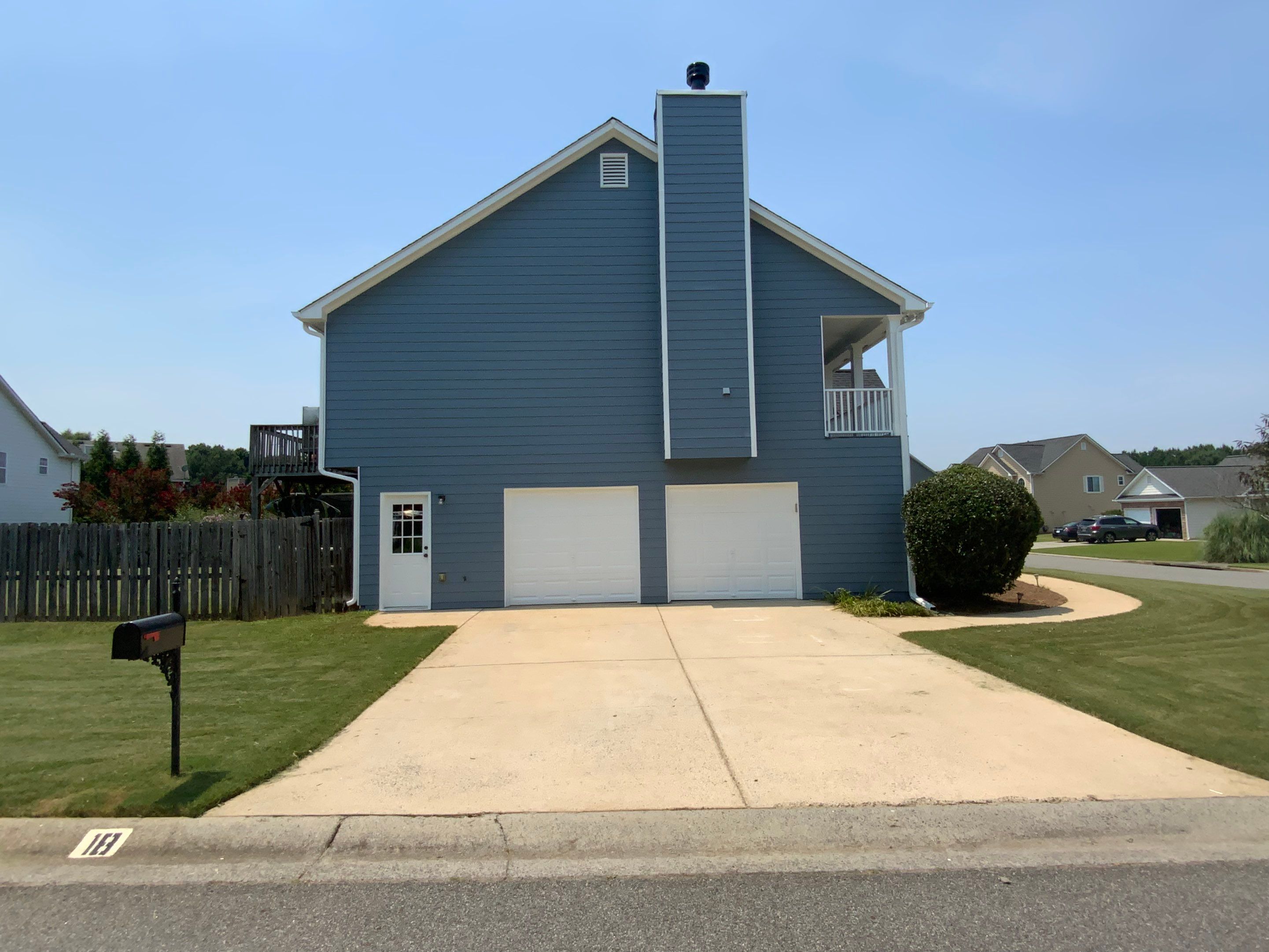 Comprehensive Exterior Painting for Cartersville Home with Blue Siding Transformation by Swift Home Renovations