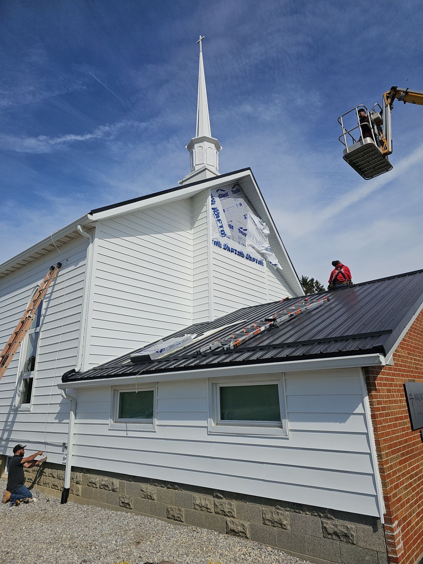 Siding Installation using Mastic 8" white  by Nitro Roofing and Construction