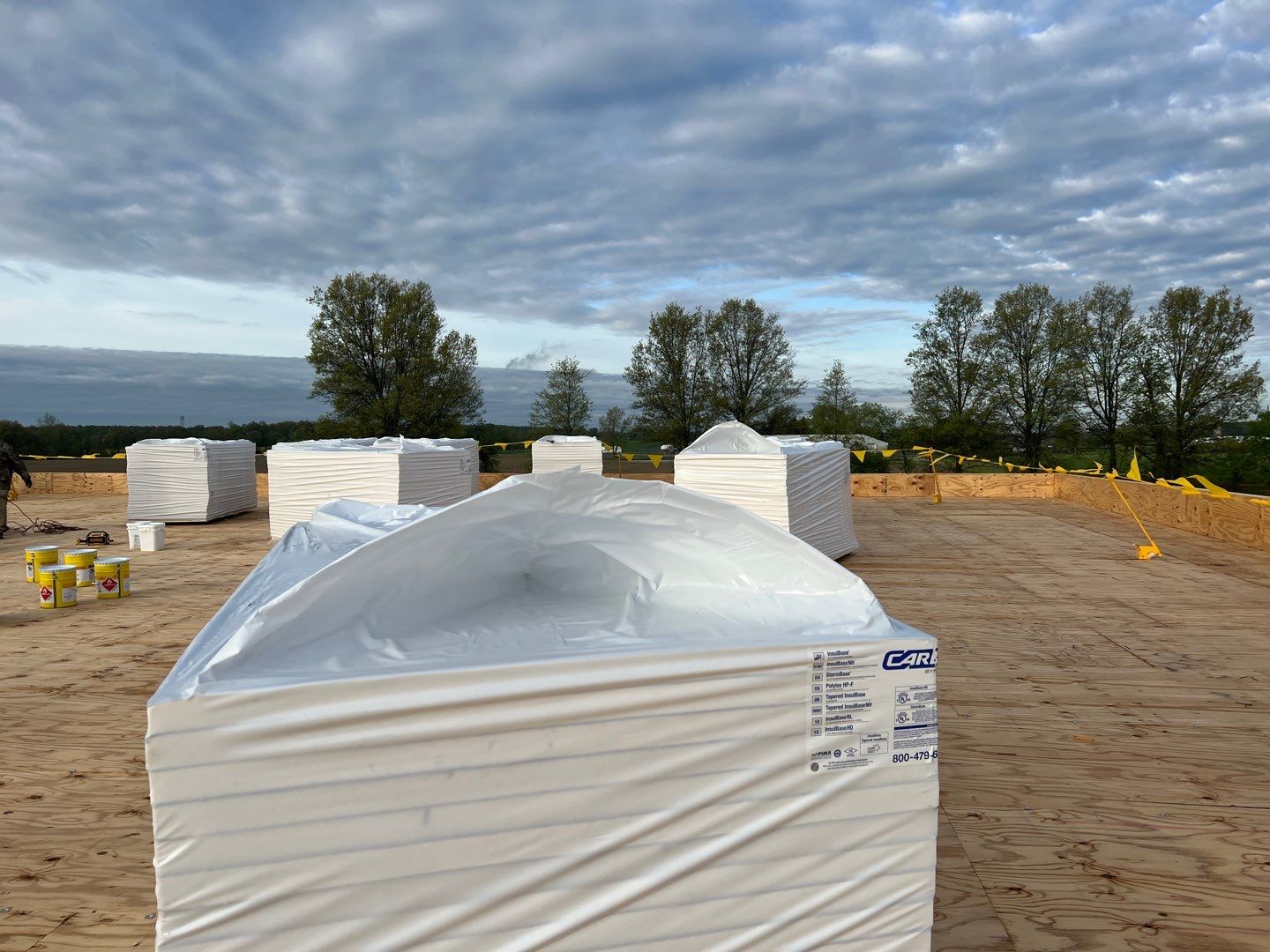Commercial Roofing Installation using 60 mil rubber roof  by Nitro Roofing and Construction