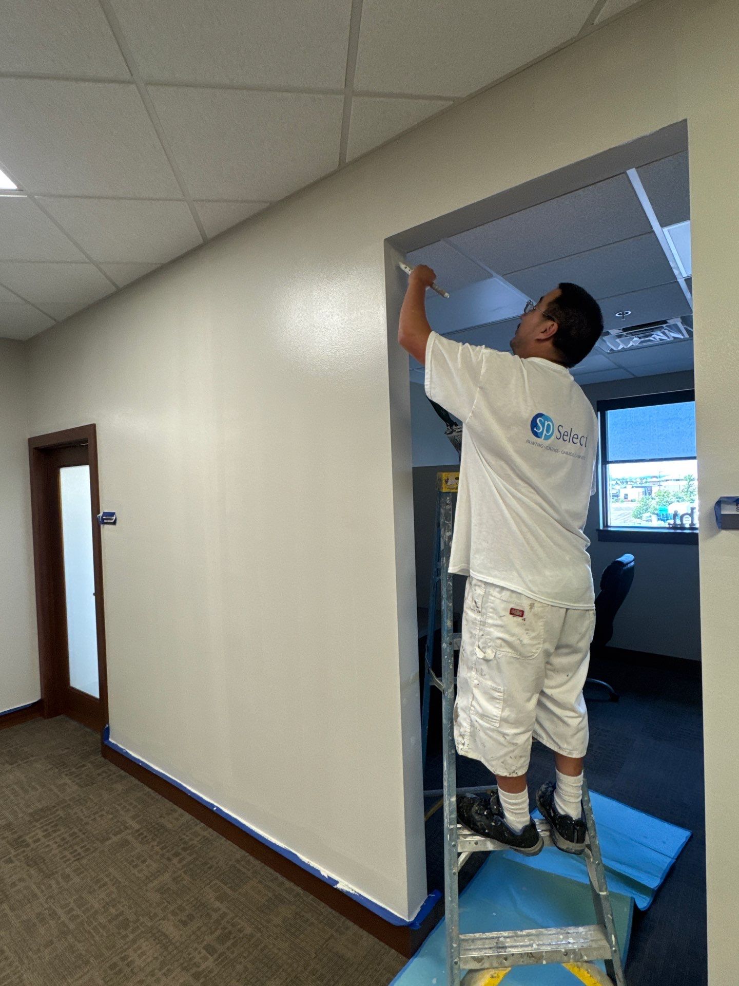 Commercial Office Interior Remodel and Modern Suite Refresh in Sioux Falls by Select Painting, Coatings & Garage Cabinets