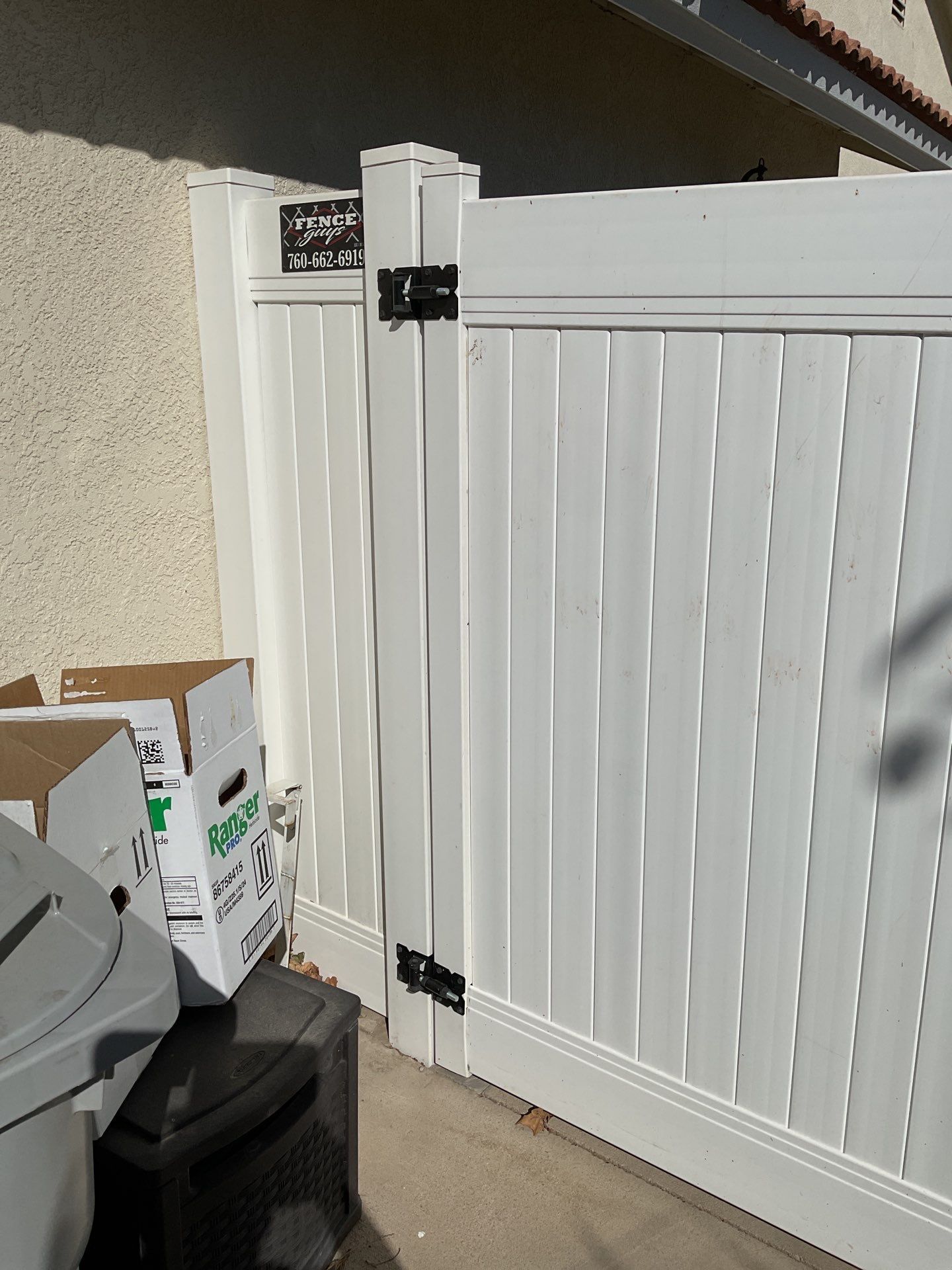 Gate installation using Vinyl by Fence Guys Inc. 