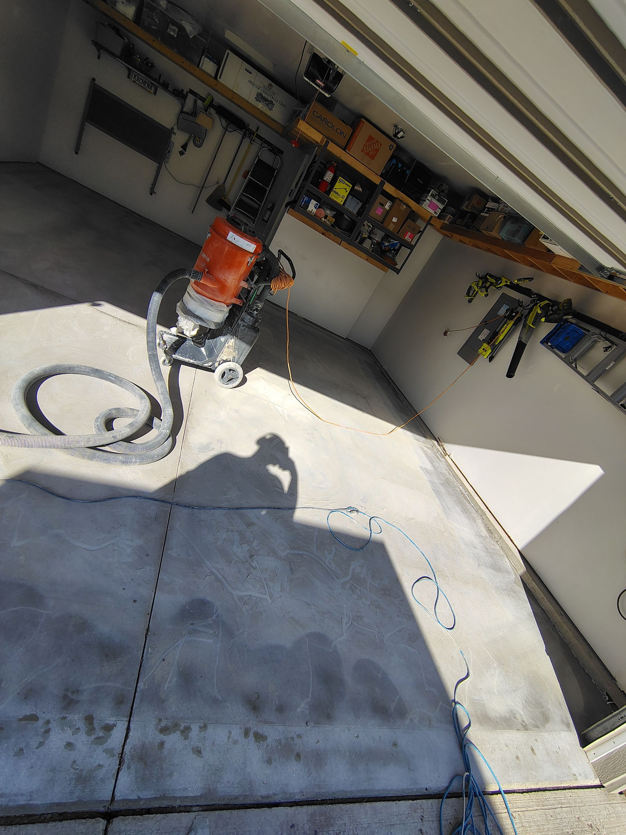 Decorative Chip Garage Concrete Coating Installation in Sioux Falls by Select Painting, Coatings & Garage Cabinets
