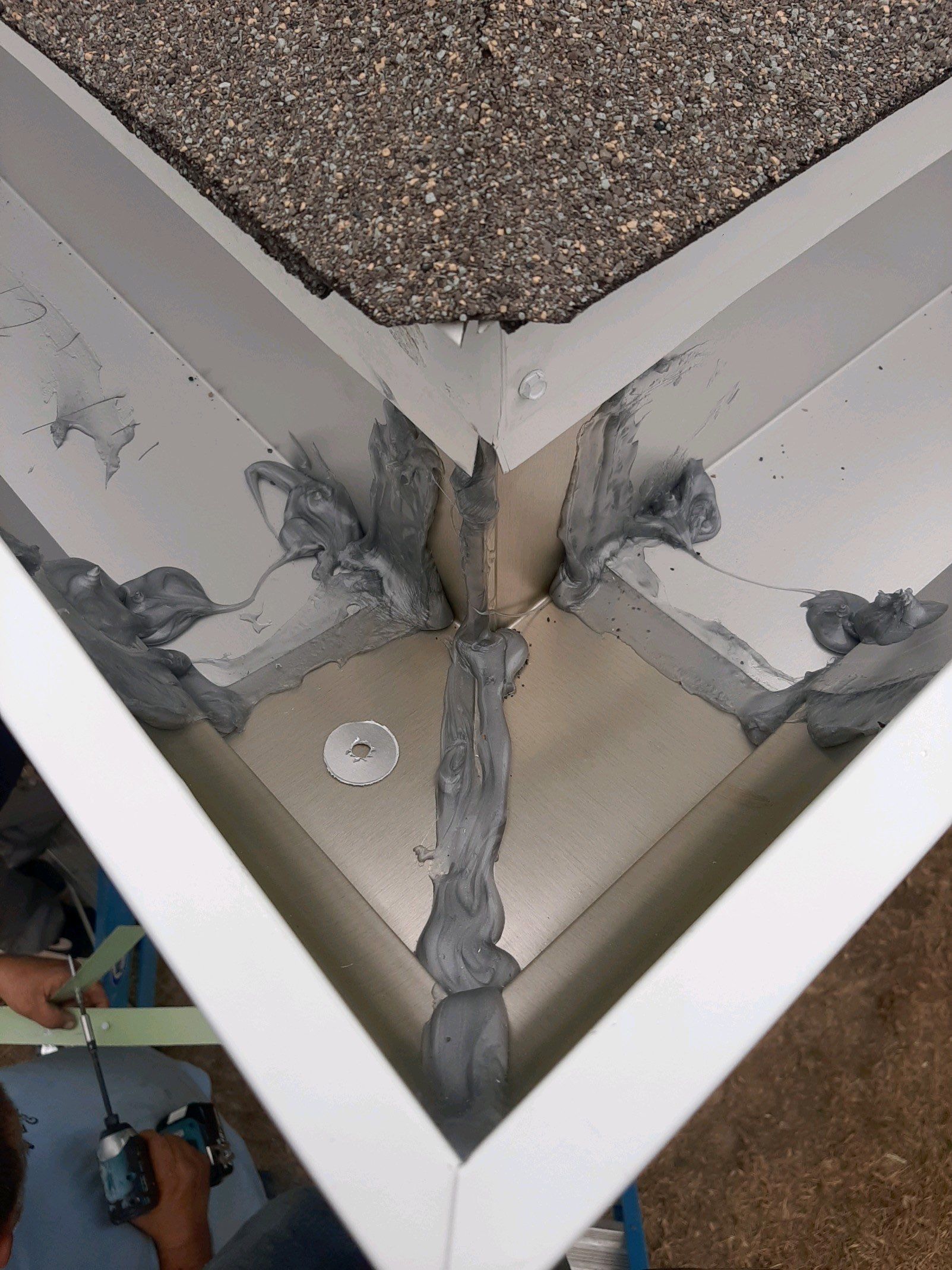 Seamless Gutter Installation Using White 6 Inch Gutters by Gutter Professors