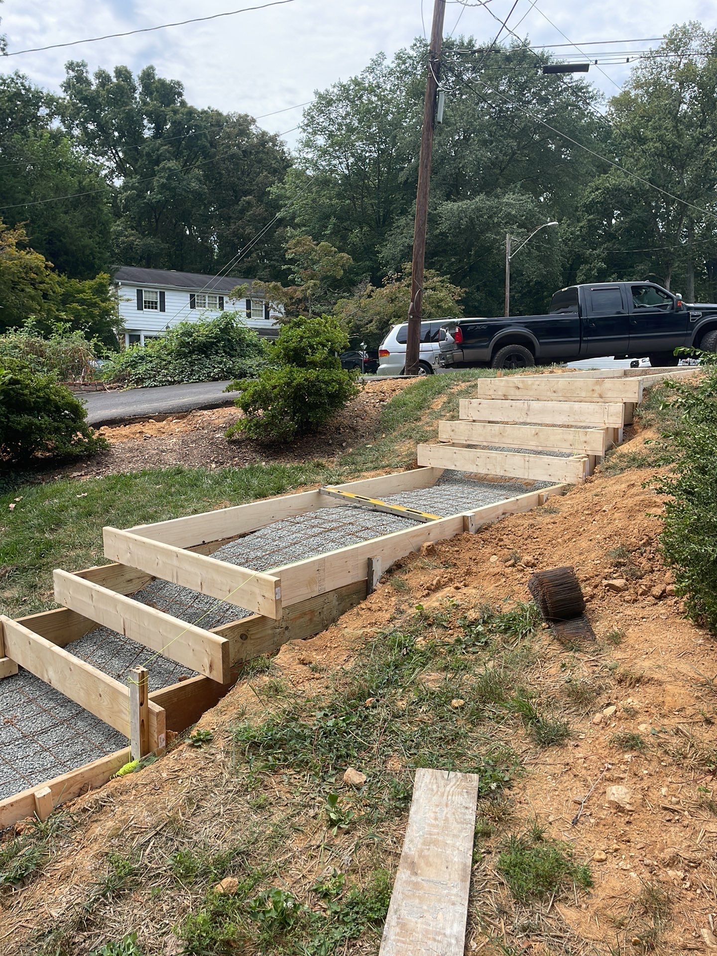 New walkway with stairs and a new front porch by Fairfax Contractors, LLC