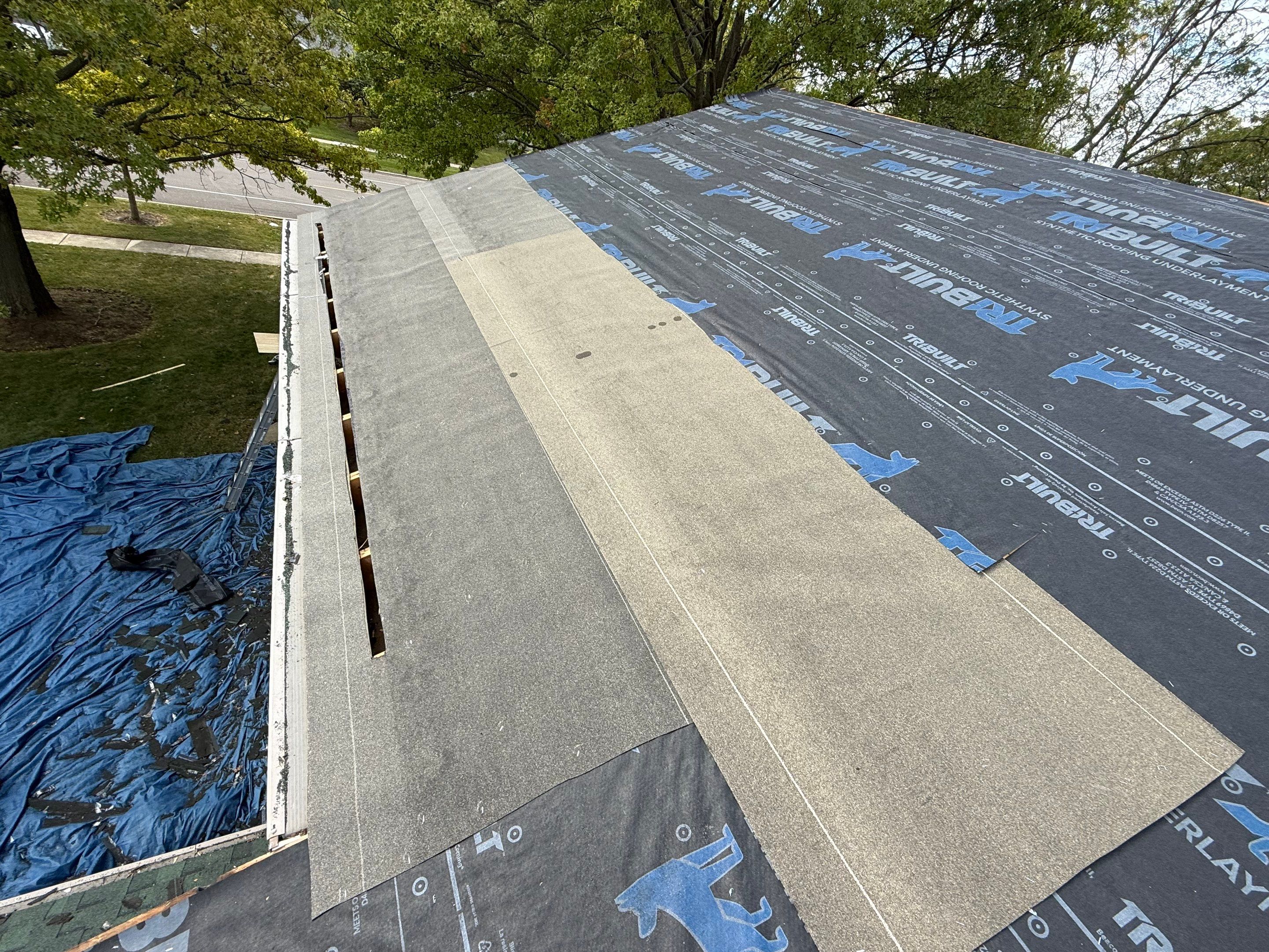 Roof & gutters by Optimal Home Improvement 