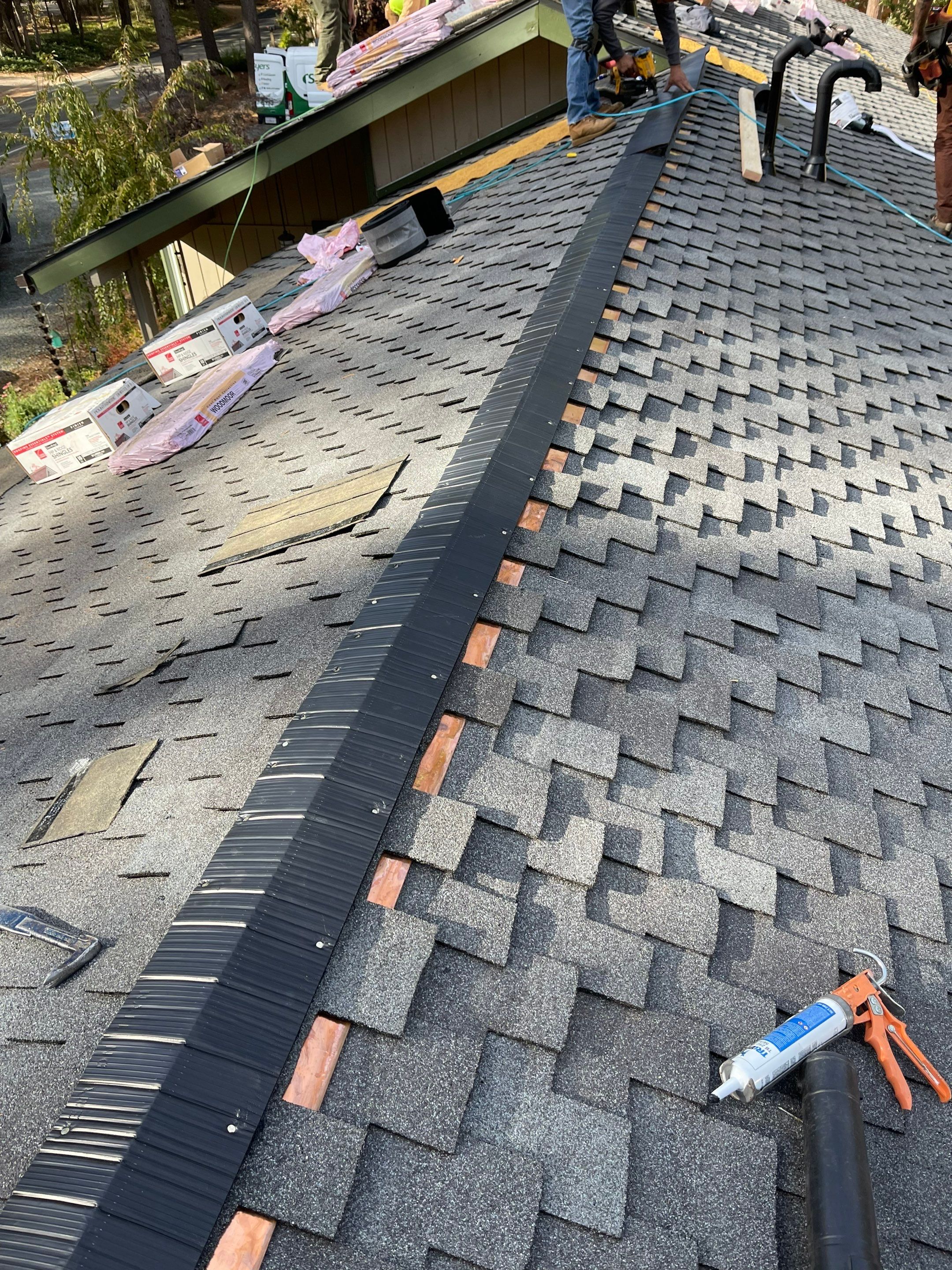 Residential Roofing Installation using Owens Corning Insulation by Byers Enterprises 