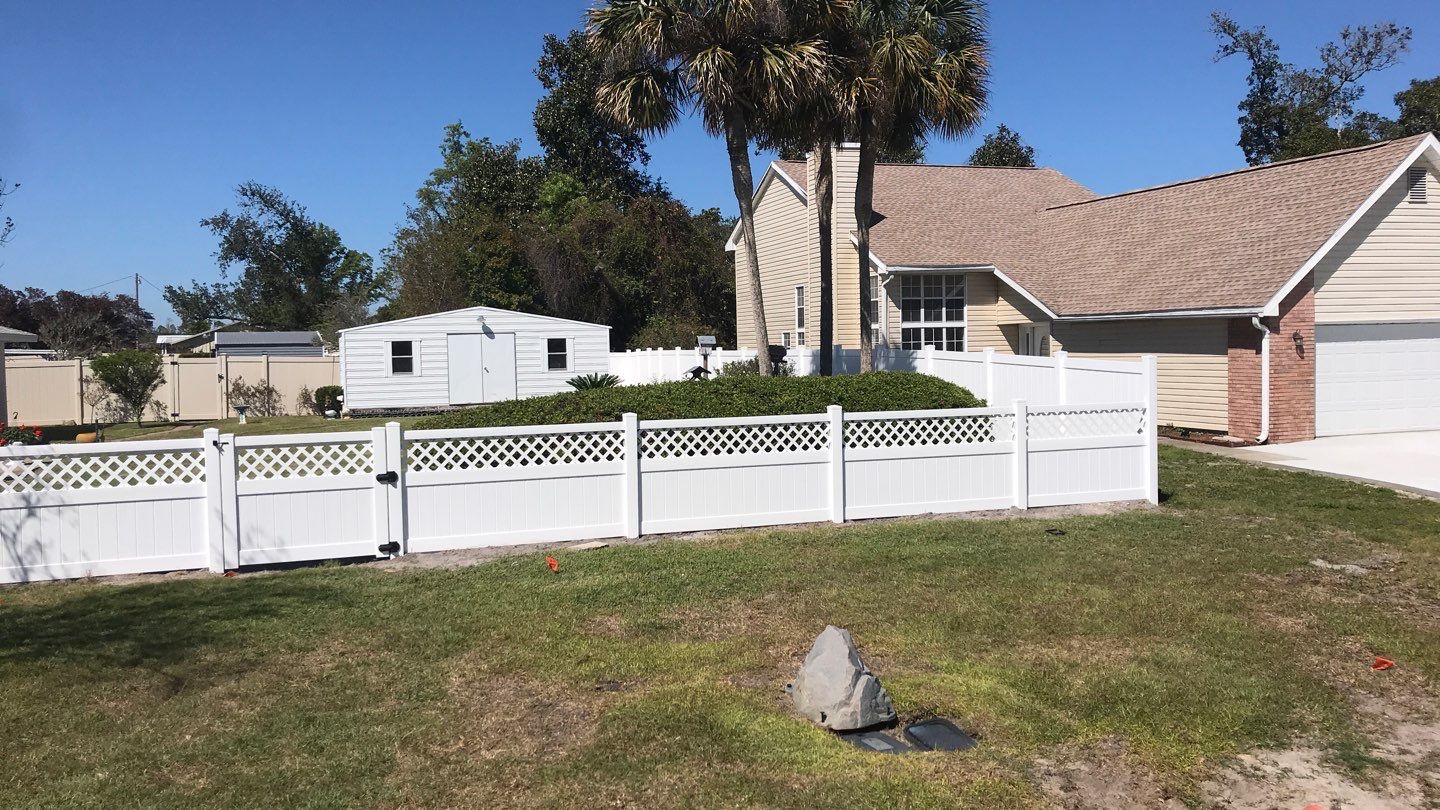 Fence Installation using White Vinyl by Hip Square Fence Inc.