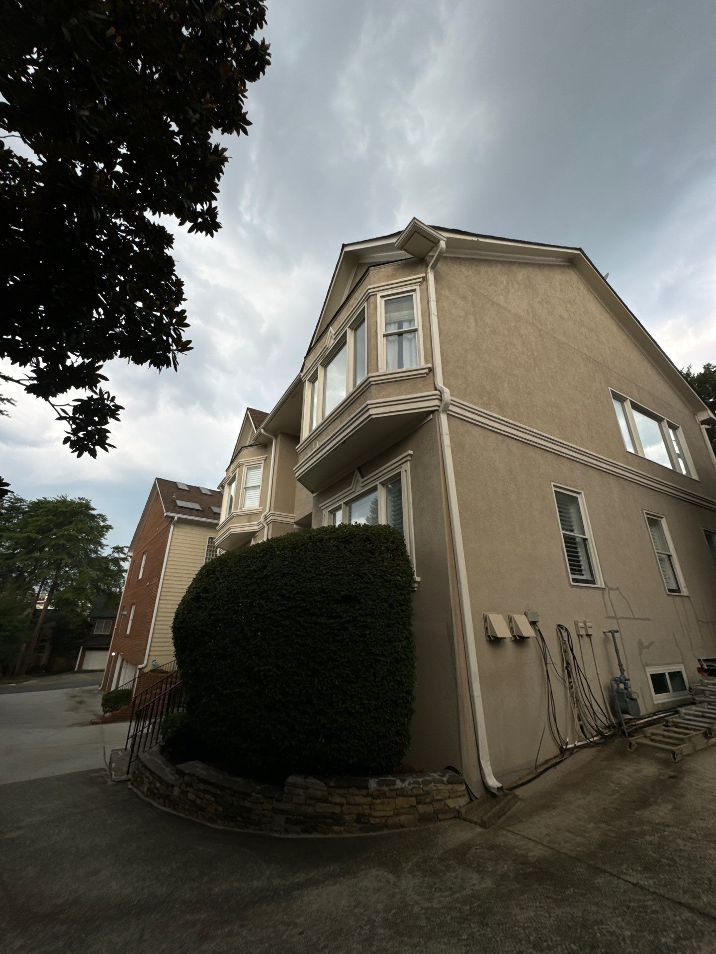 Full Exterior Stucco Painting and Wood Deck Staining in Atlanta by Swift Home Renovations