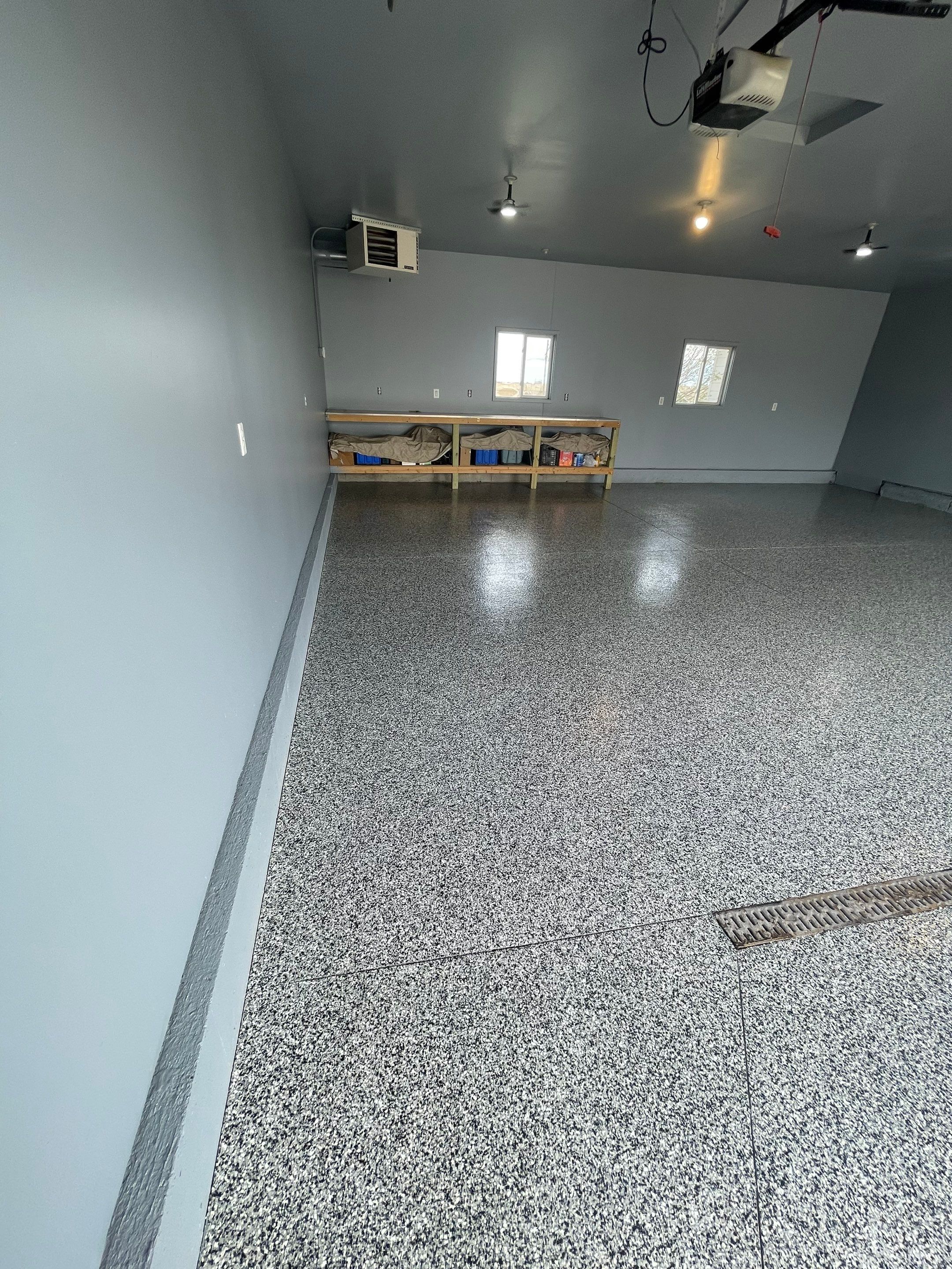 Grey Granite-Style Garage Floor Coating and Stairs in Hartford by Select Painting, Coatings & Garage Cabinets