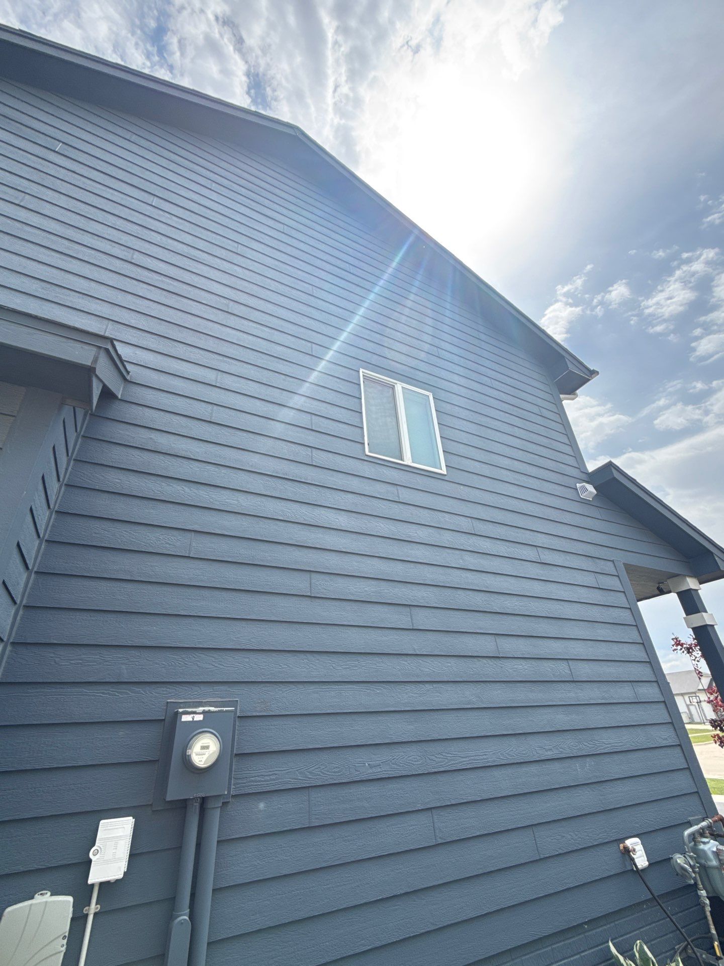 Residential Exterior Repaint in Ankeny by Midwest Paint LLC