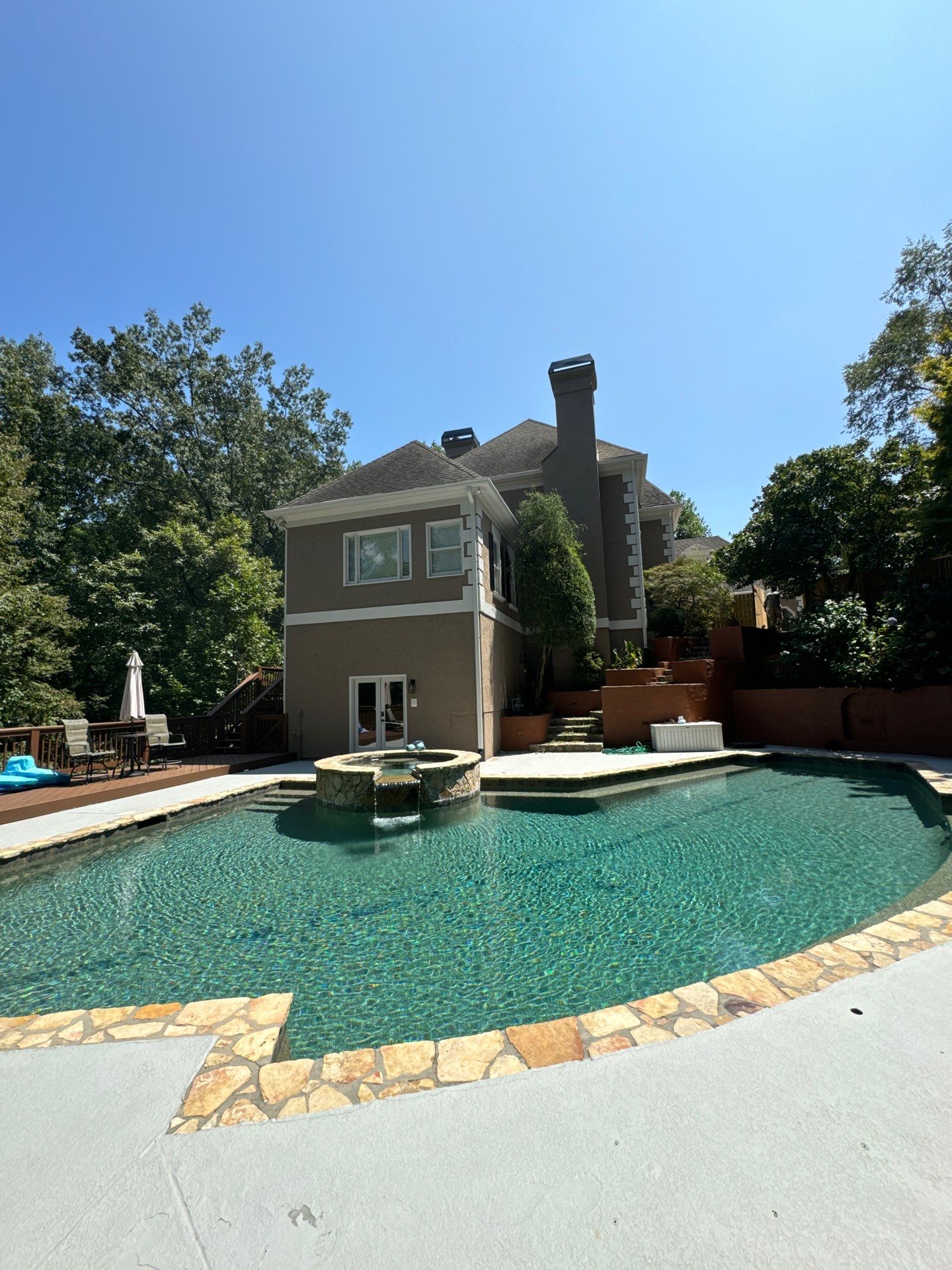 Atlanta Exterior Refresh Featuring Wood Privacy Fence and Door Painting by Swift Home Renovations