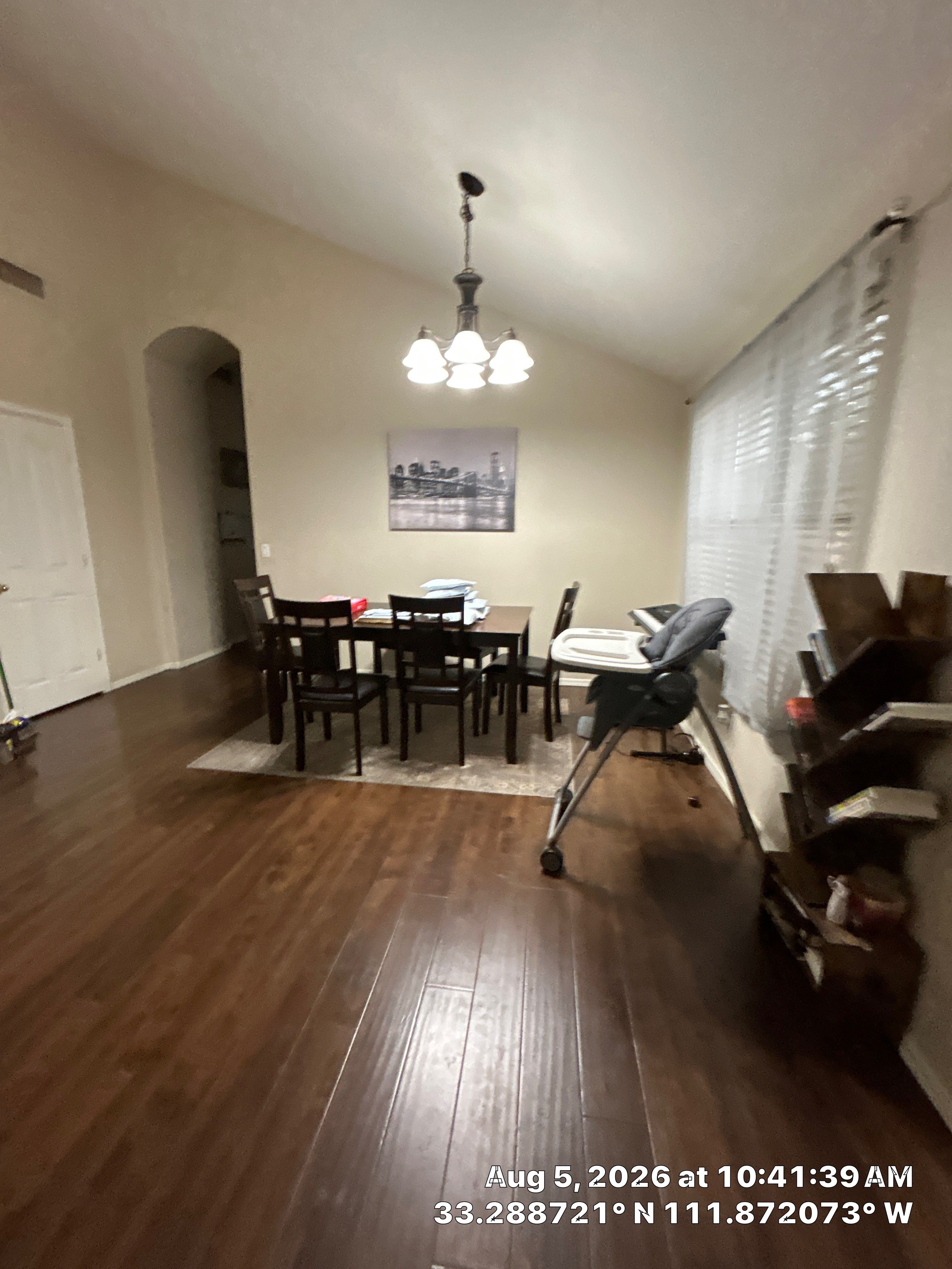 Chandler Dining Room Renovation Featuring New Lighting and Wood-Look Flooring by CompanyCam Sales Demo