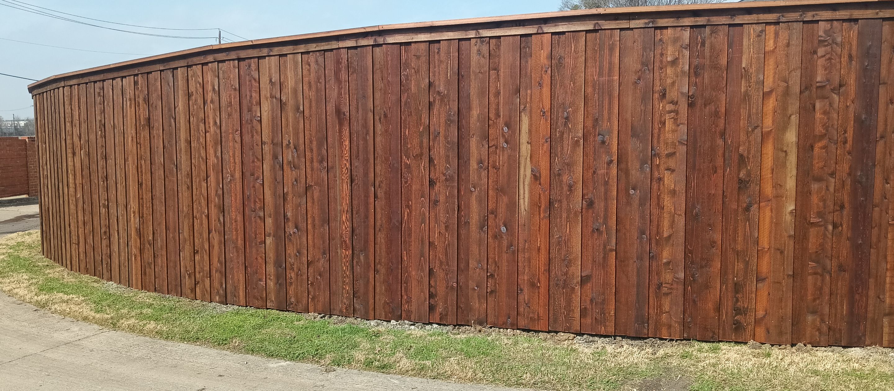 Pre-Stained 8' Board on Board cedar w/ trim and cap  by Grizzly Fence And Patio