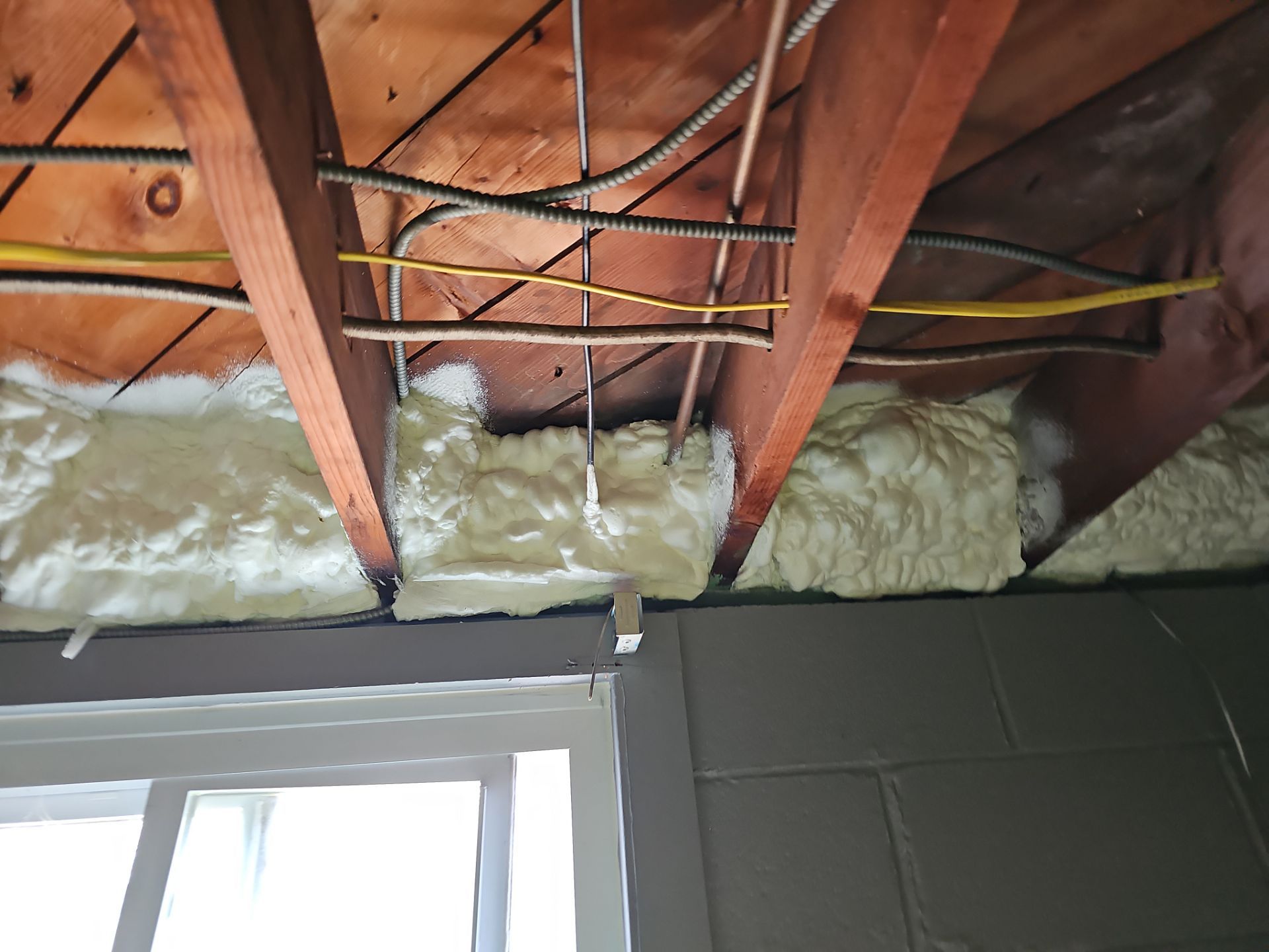 Attic Insulation using open cell spray foam by NYS Foam & Energy