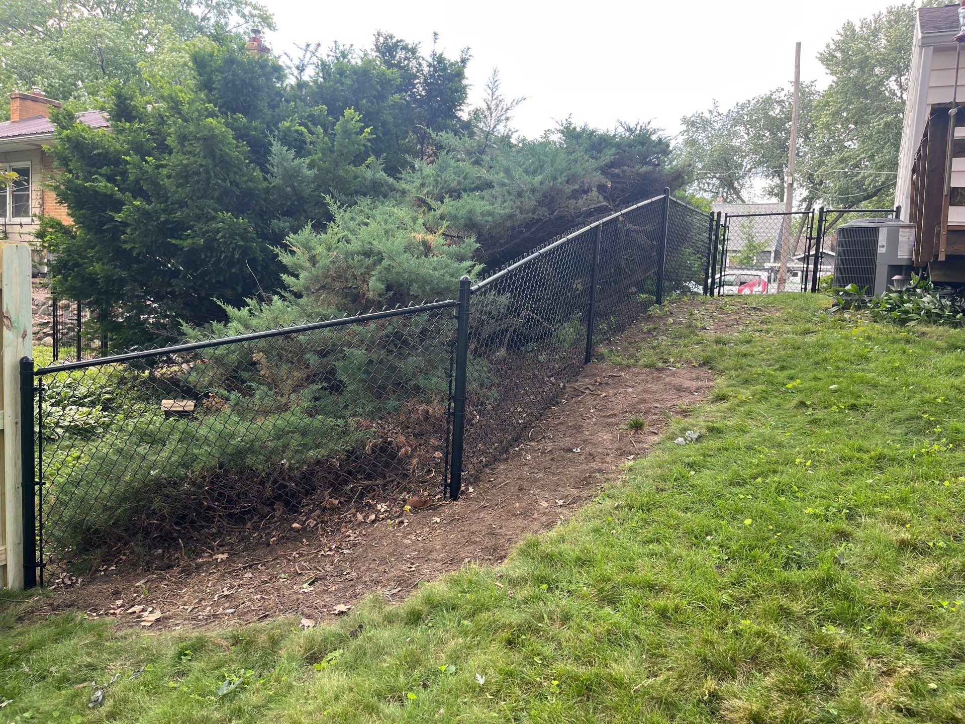 Custom Treated Pine Privacy Fence and Chain Link Installation in Cedar Falls by Perfect Picket Fence and Stain