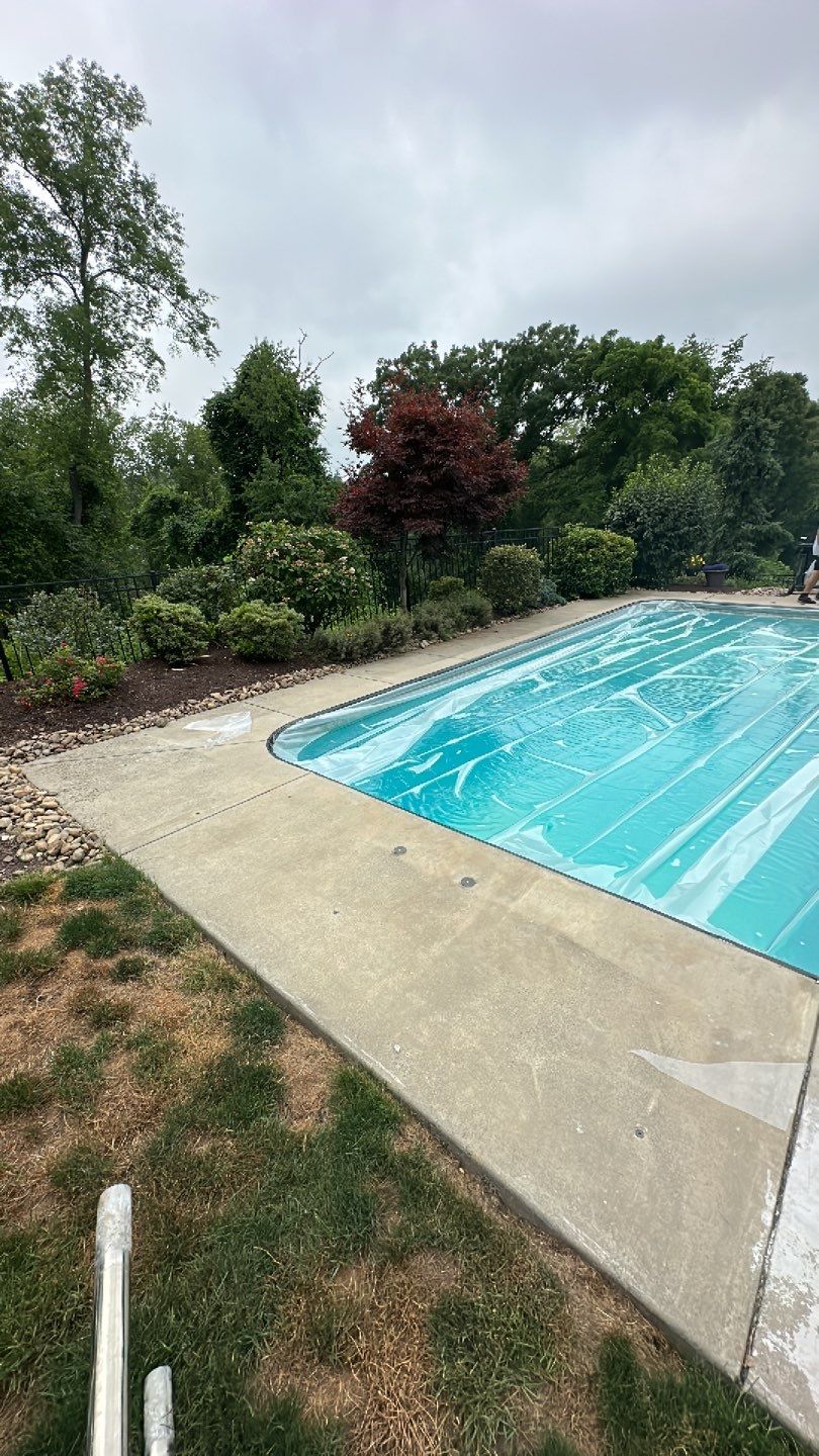 Pool Deck + Driveway + Garage Project in Venetia by Floors in a Day, Inc