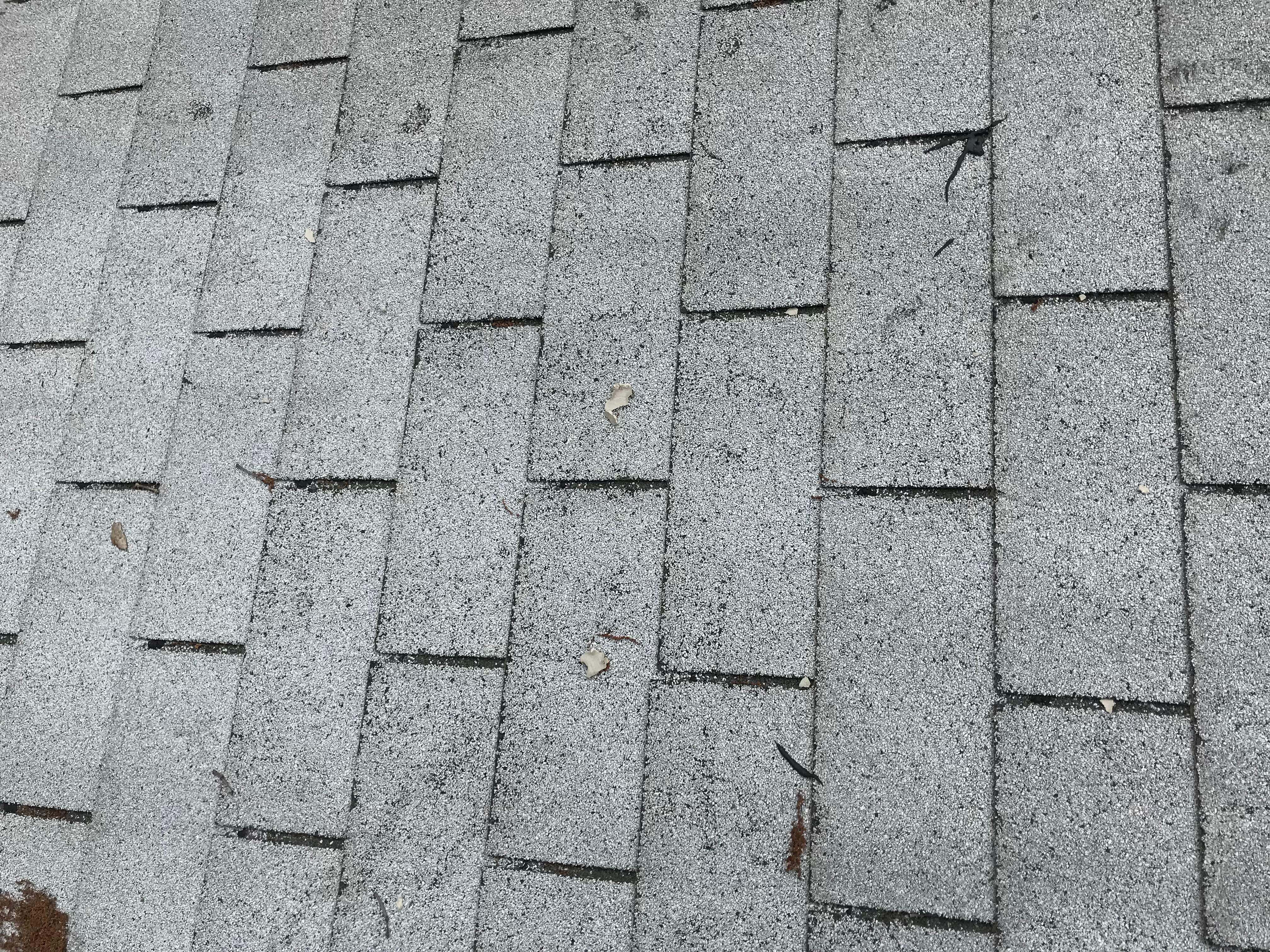 Residential Roofing Installation using Charcoal Black by Alpha Design Services