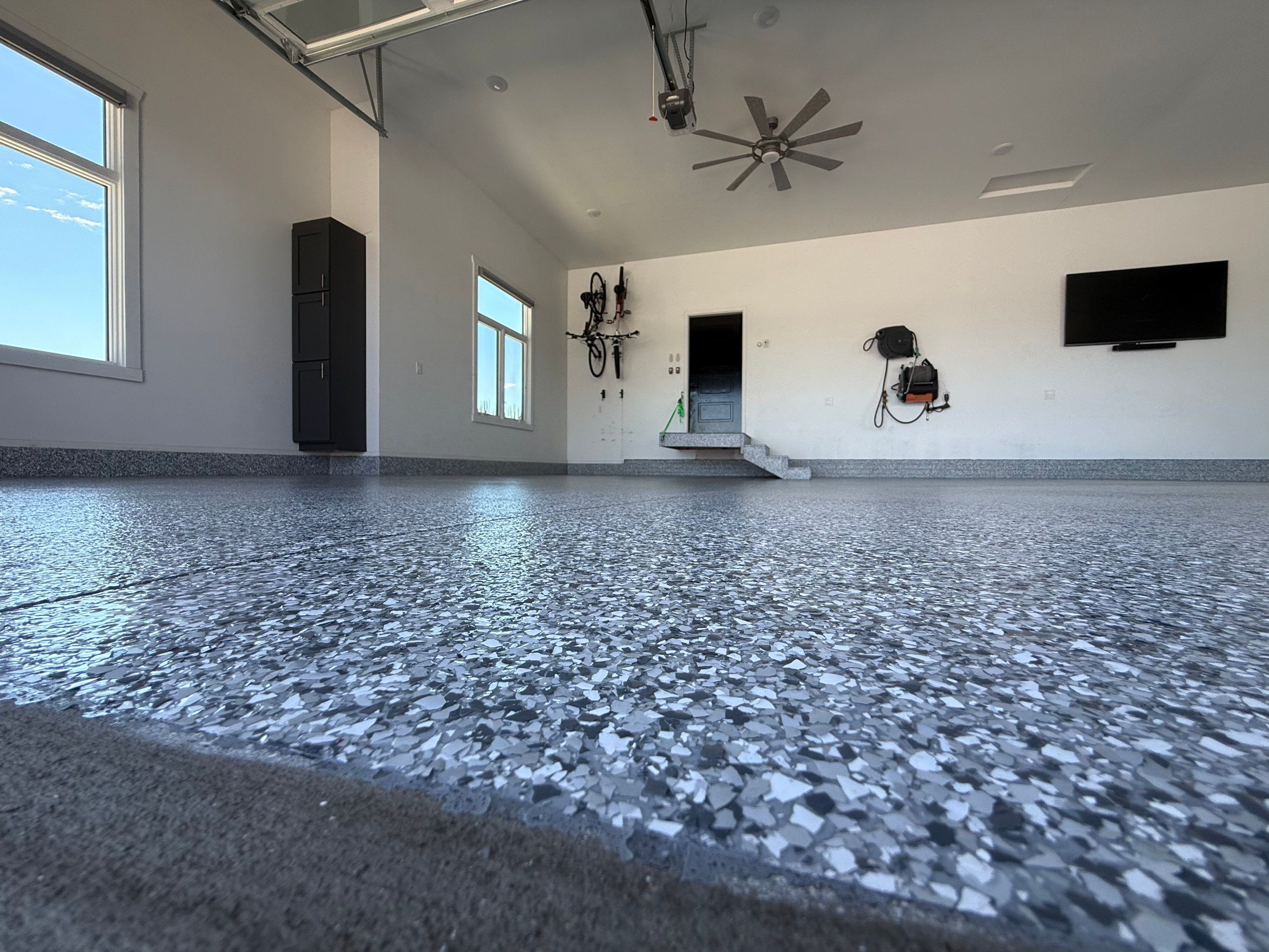 Gravel Flake Garage Floor Coating in Yankton by Select Painting, Coatings & Garage Cabinets