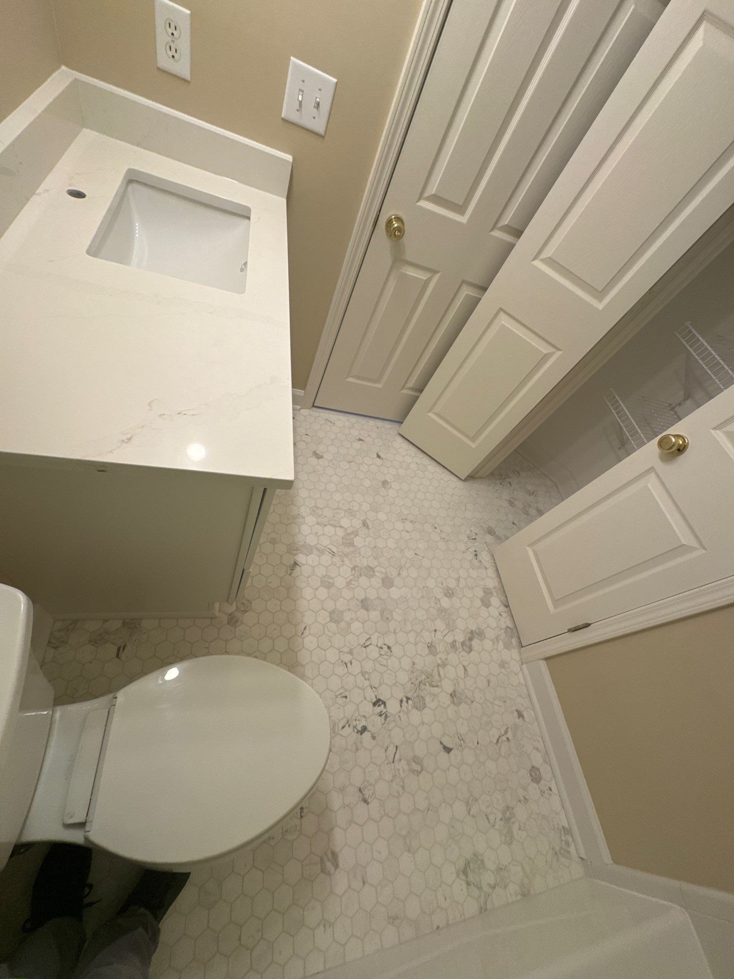Marietta Bathroom and Laundry Room Floor and Vanity Remodel by Swift Home Renovations