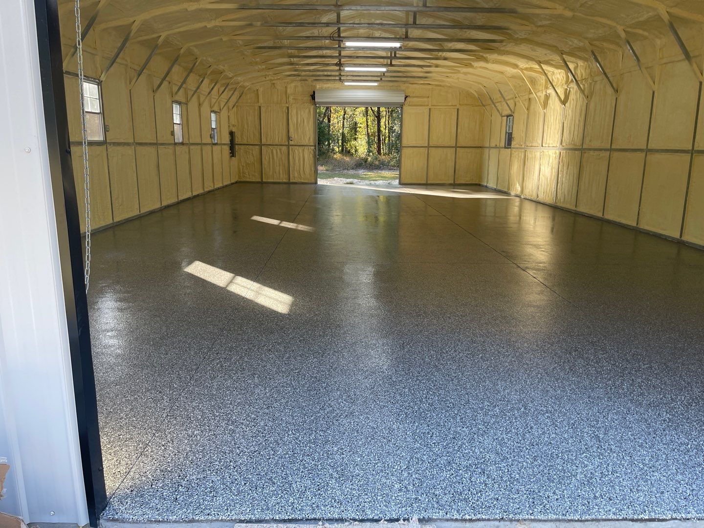 Metal Building/Kennel in Williston, FL in Smoke by Cross Creek Concrete Coatings