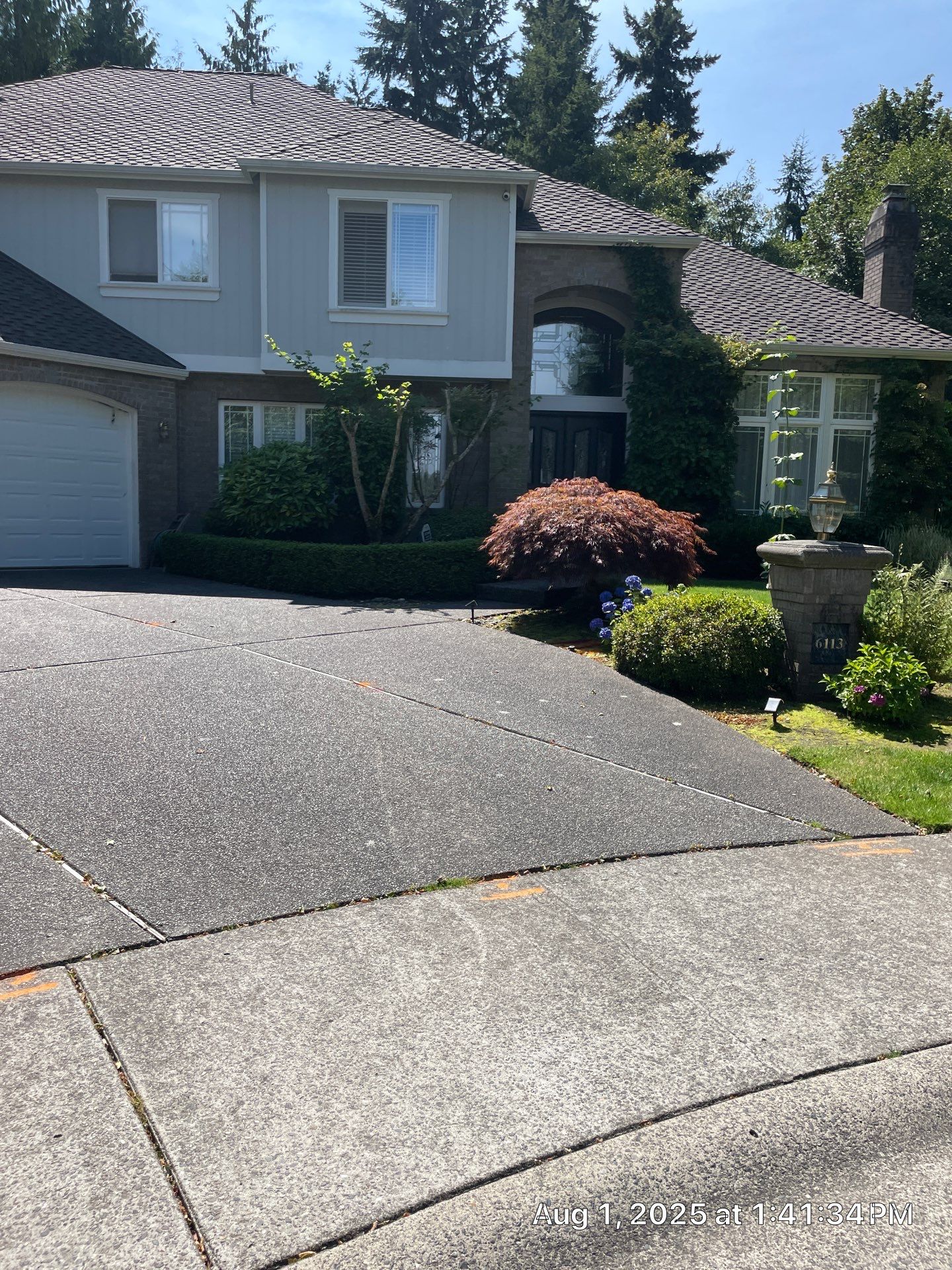 Multi-color Stamped & Sealed Concrete Driveway Renovation | Mukilteo by Jireh Asphalt & Concrete Inc