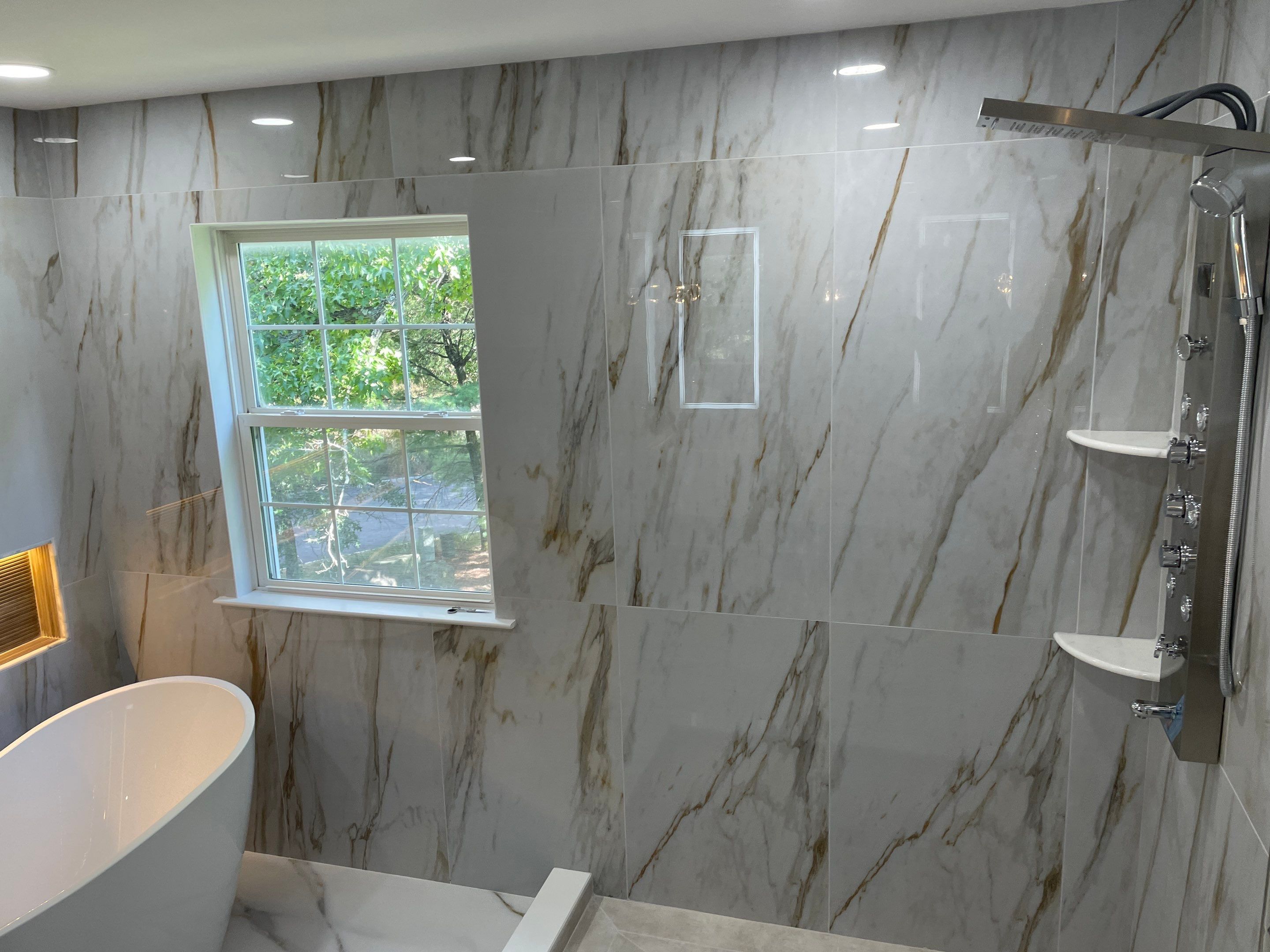 Bathroom Remodel using Tile by Home Concepts Construction