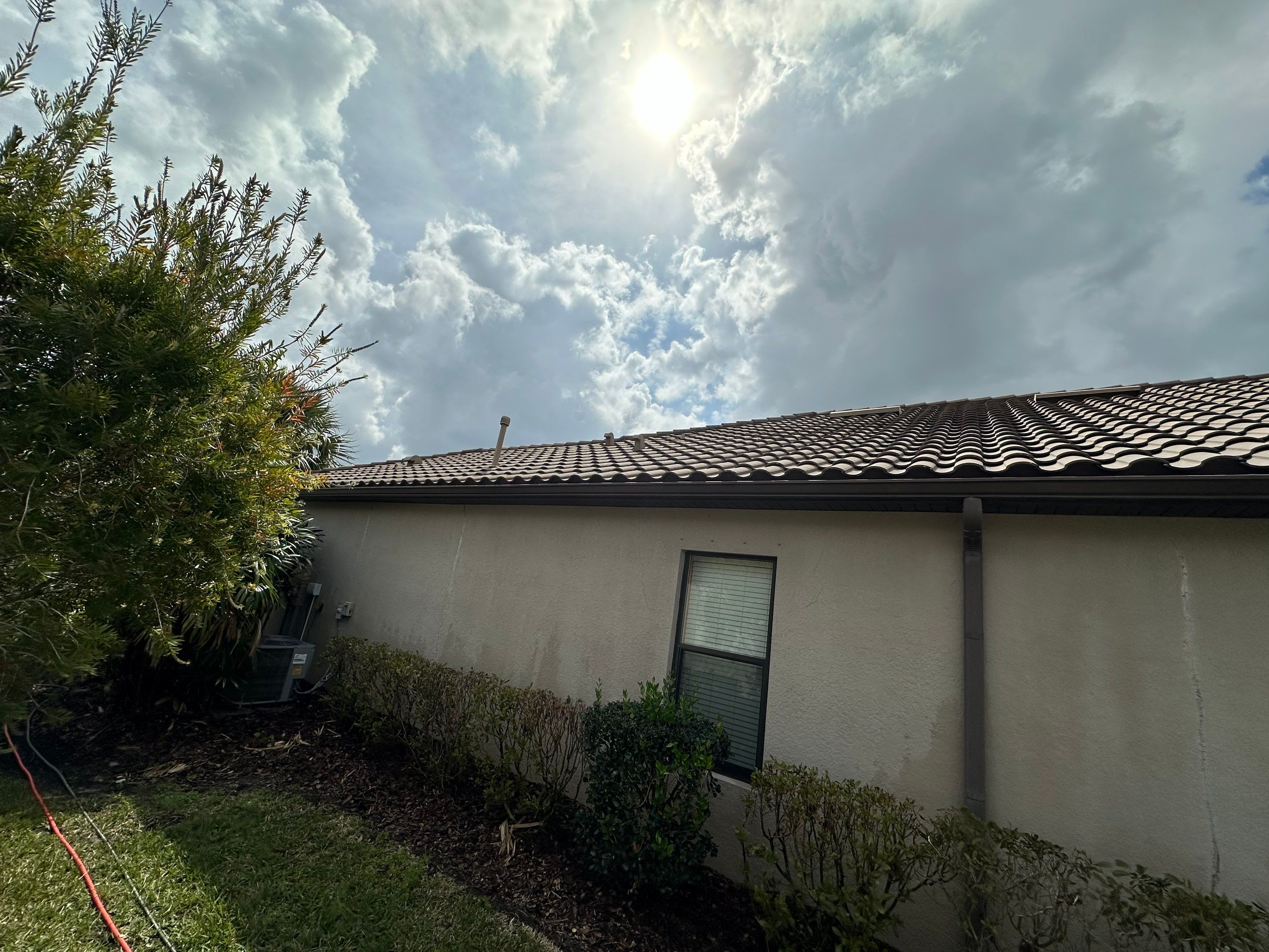 Concrete Tile Roof, Paver Pool Deck, Screen Enclosure & Driveway Cleaning in Artisan Lakes Esplanade, Palmetto, FL | Sunshine AquaWash by Sunshine AquaWash