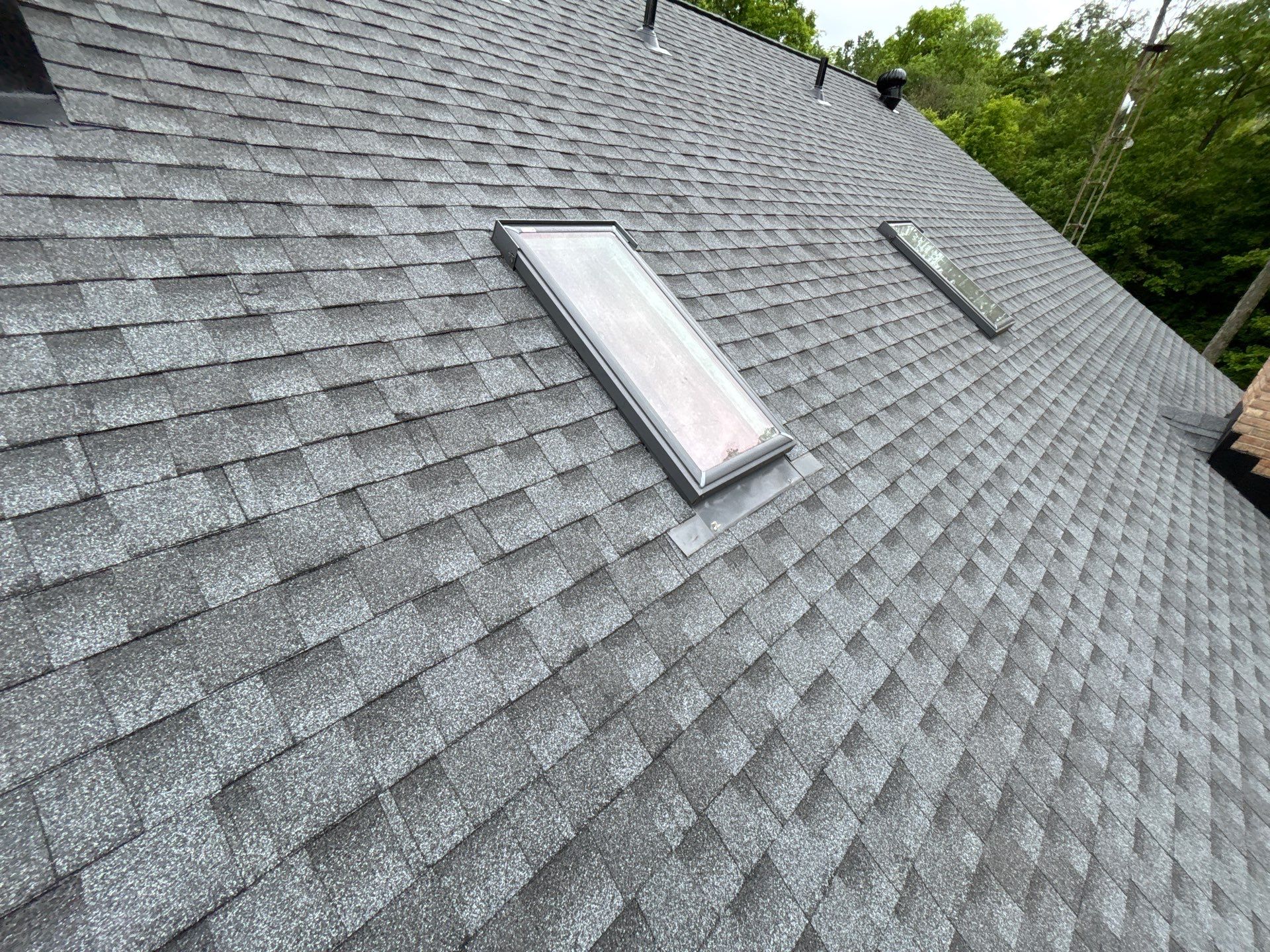 Residential Roofing Installation using GAF HDZ Pewter Gray by Nitro Roofing and Construction
