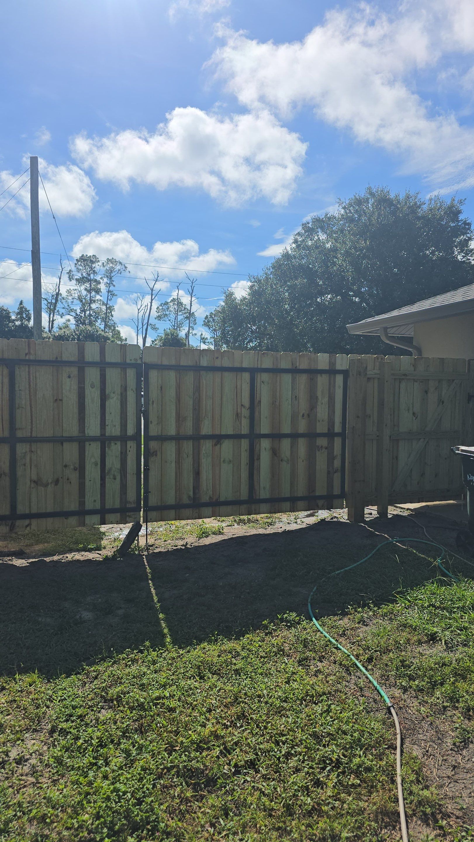 Pressure-Treated Wood Privacy Fence and Gate Installation in North Port by True Fence LLC