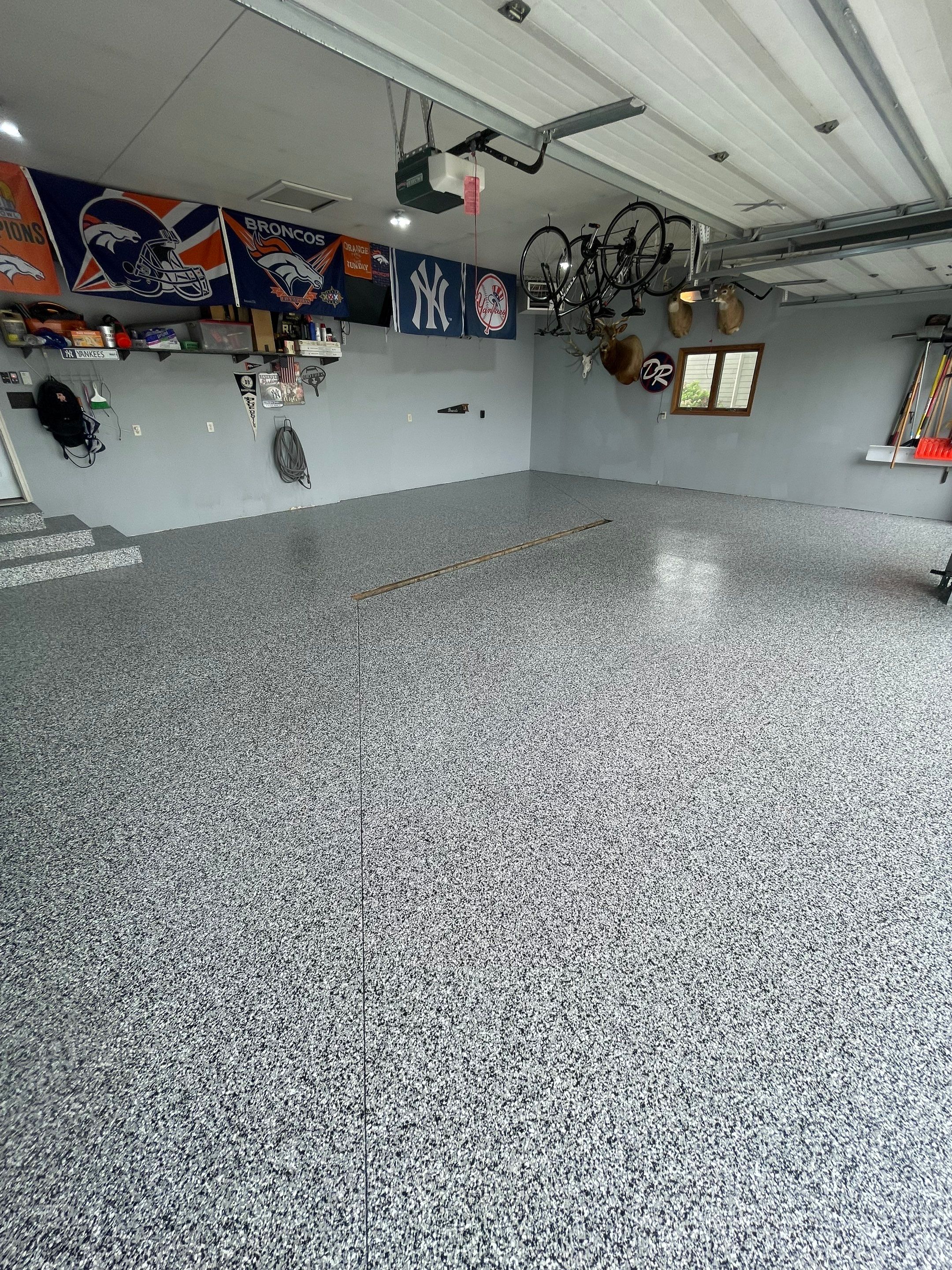 Full Garage Floor Epoxy Coating Installation in Dell Rapids by Select Painting, Coatings & Garage Cabinets