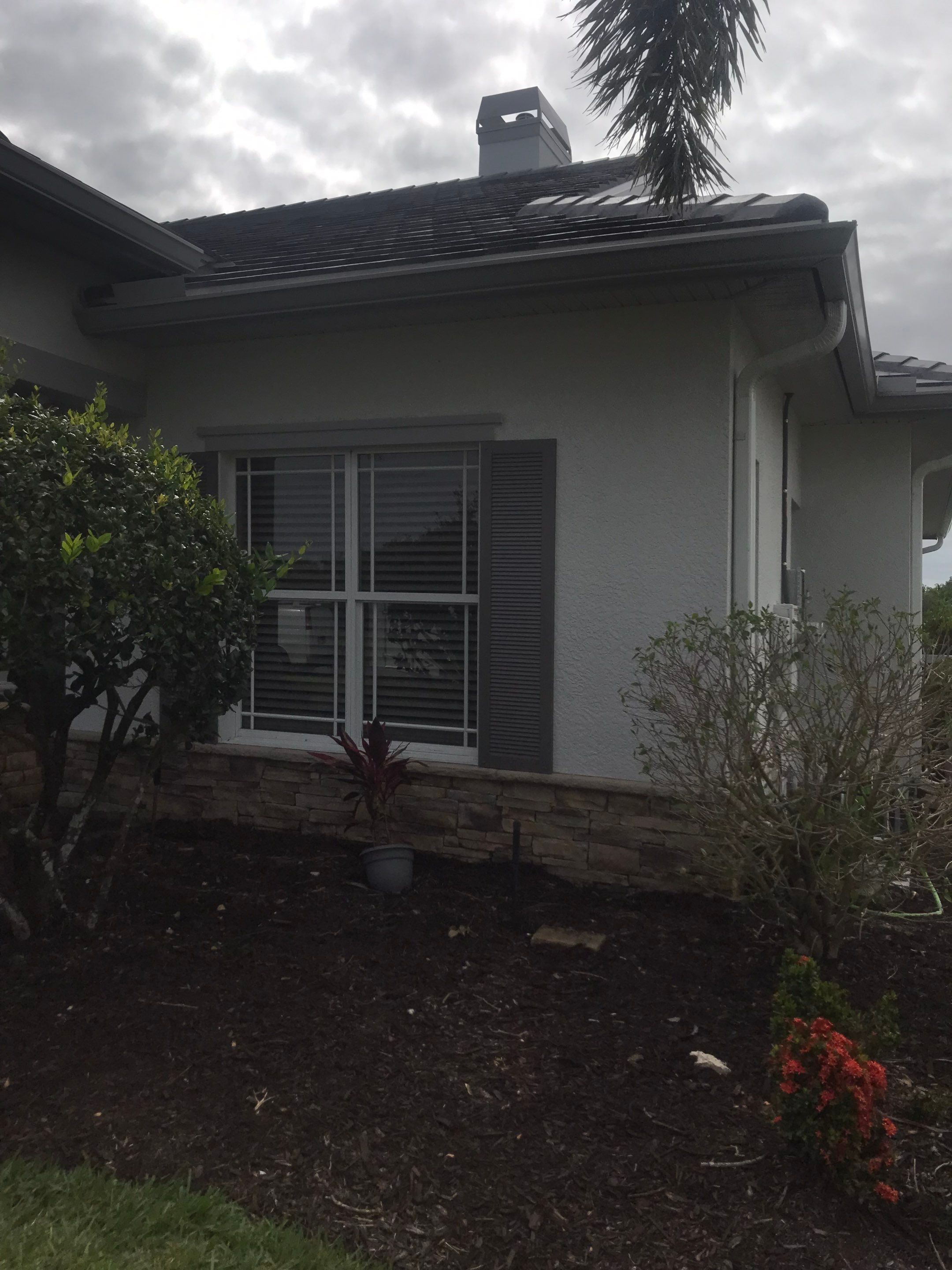 7-inch Grey Gutter Installation and White Downspouts in Fort Myers FL  by Gutter Professors