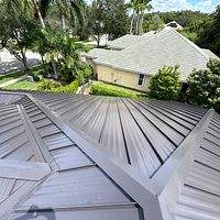 24ga 1.5" Mechanical Seam Dark Bronze by Total Roofing System The Metal Roof Experts