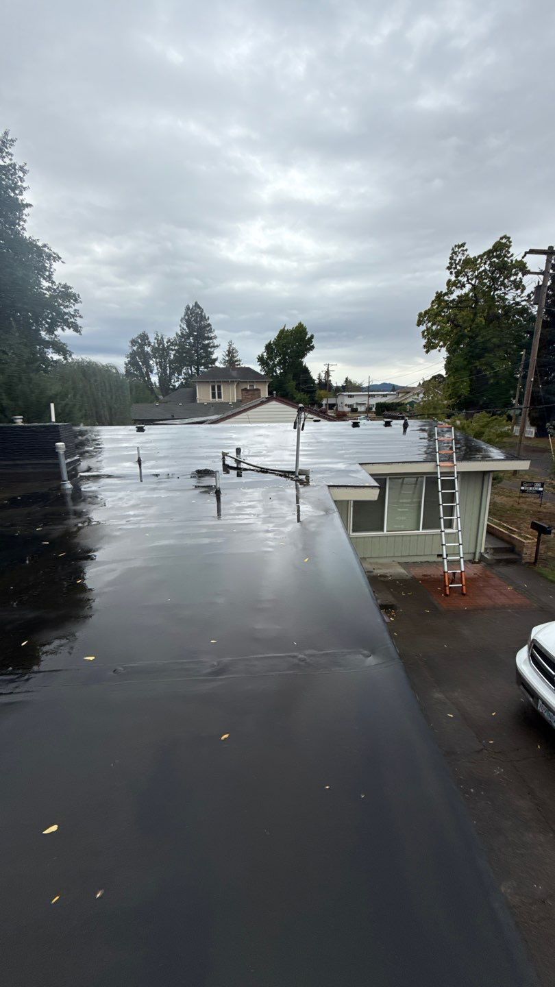 Residential Membrane Roof Replacement by Orezona Building & Roofing Company, Inc.