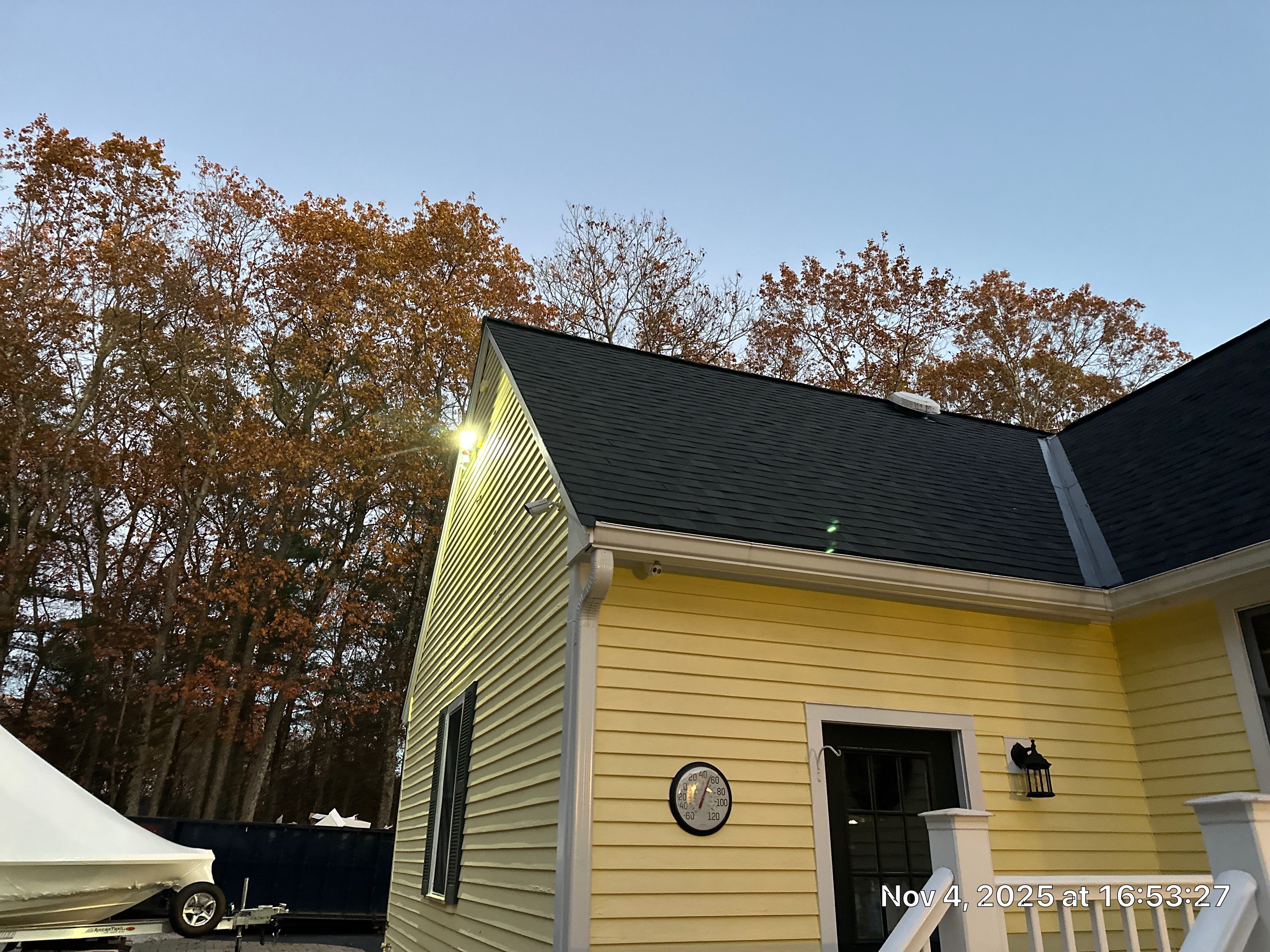 Chelmsford Premium Roof: Onyx Black Shingles with Standing Seam Metal Porch by Mighty Dog Roofing of Greater Middlesex County