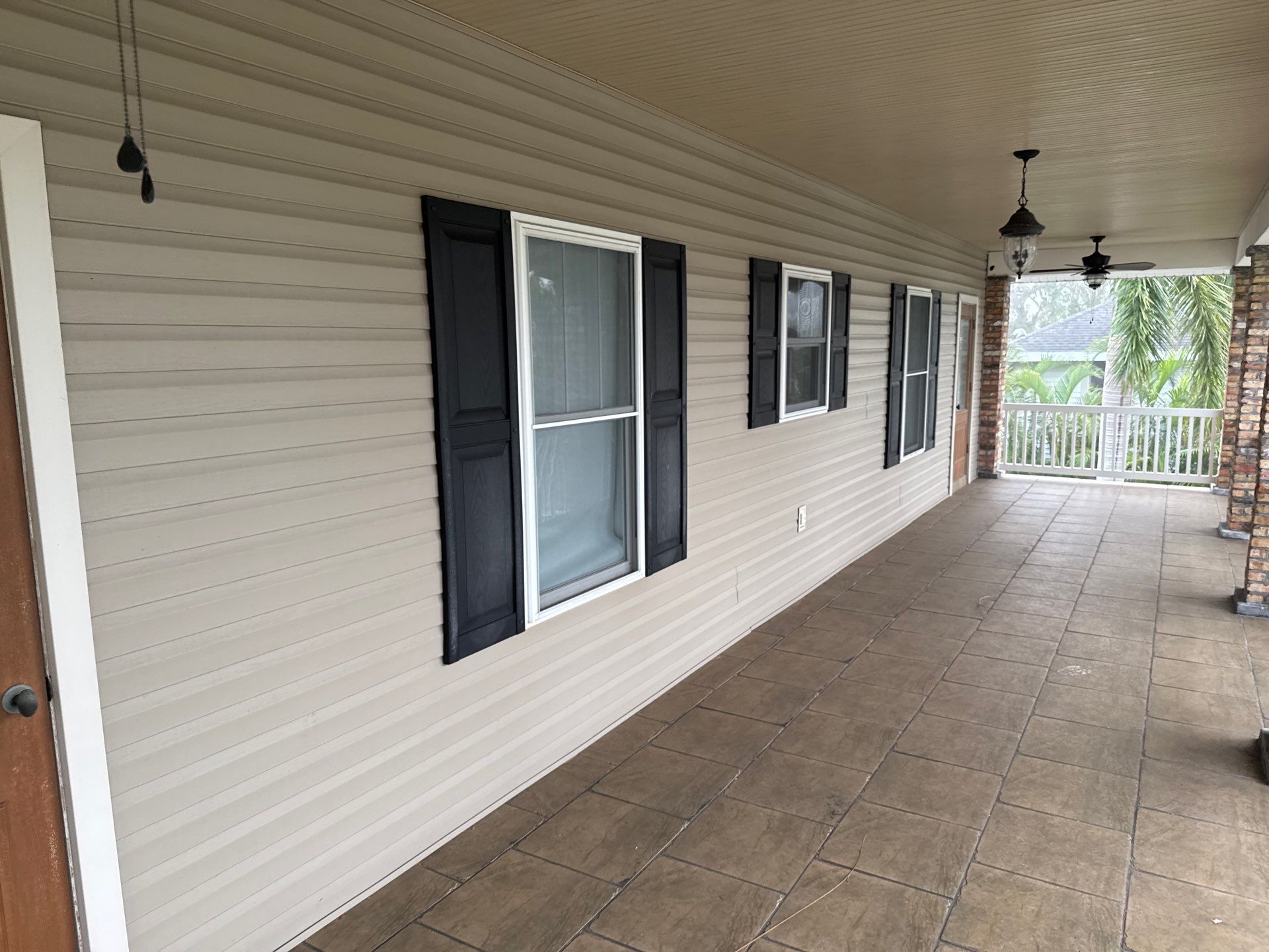 2-Story House Wash and Garage Pressure Washing in Palmetto, FL by Sunshine AquaWash