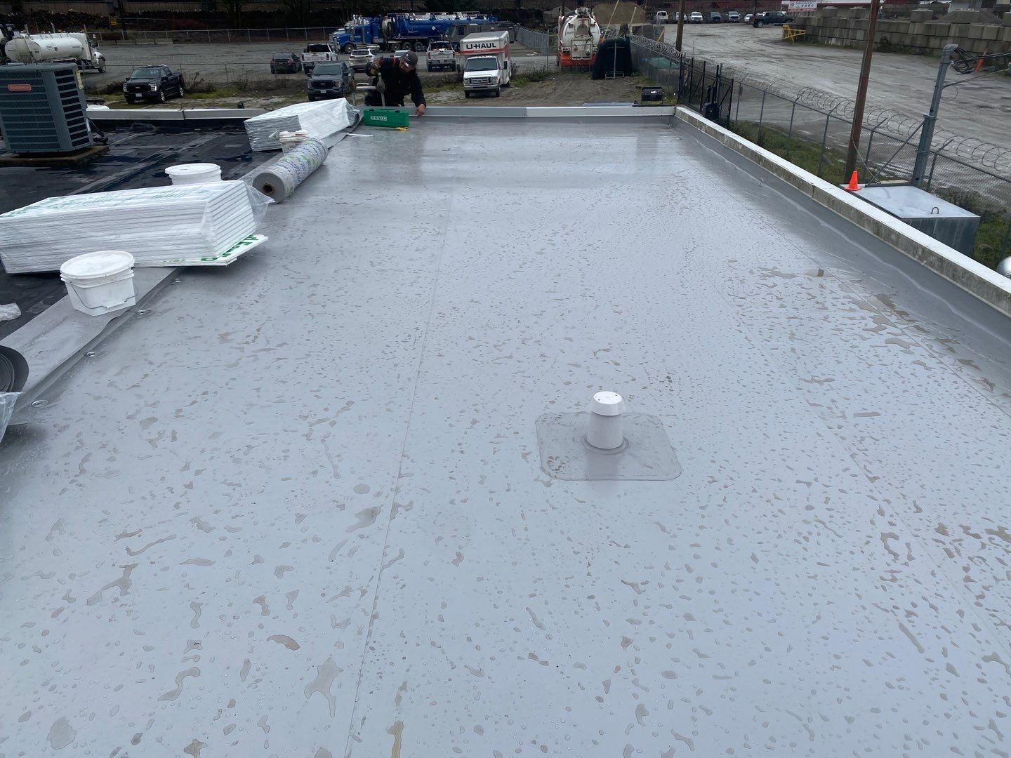 Commercial Roofing Installation using Durolast by Top Notch Roofing Inc