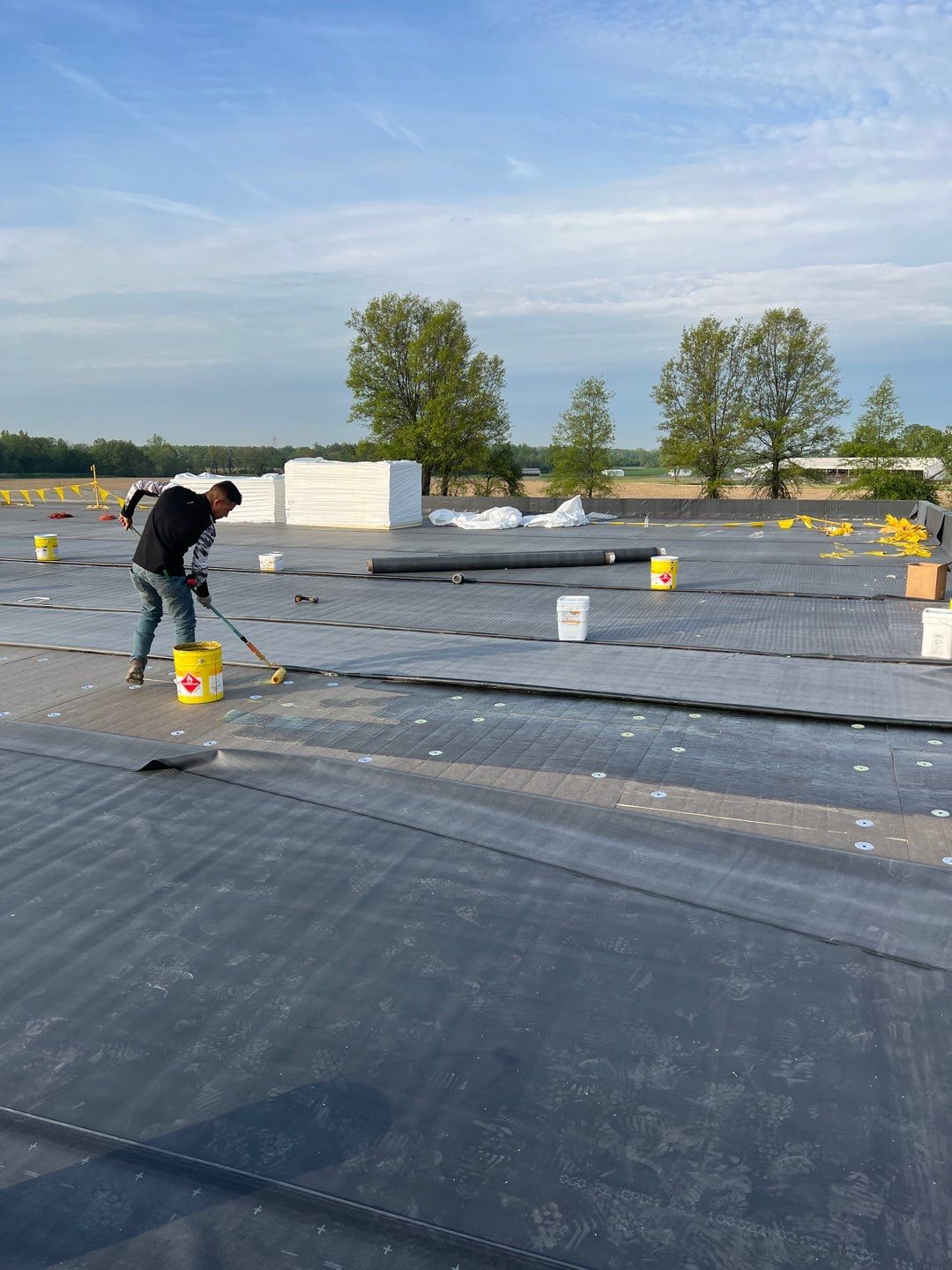 Commercial Roofing Installation using 60 mil rubber roof  by Nitro Roofing and Construction
