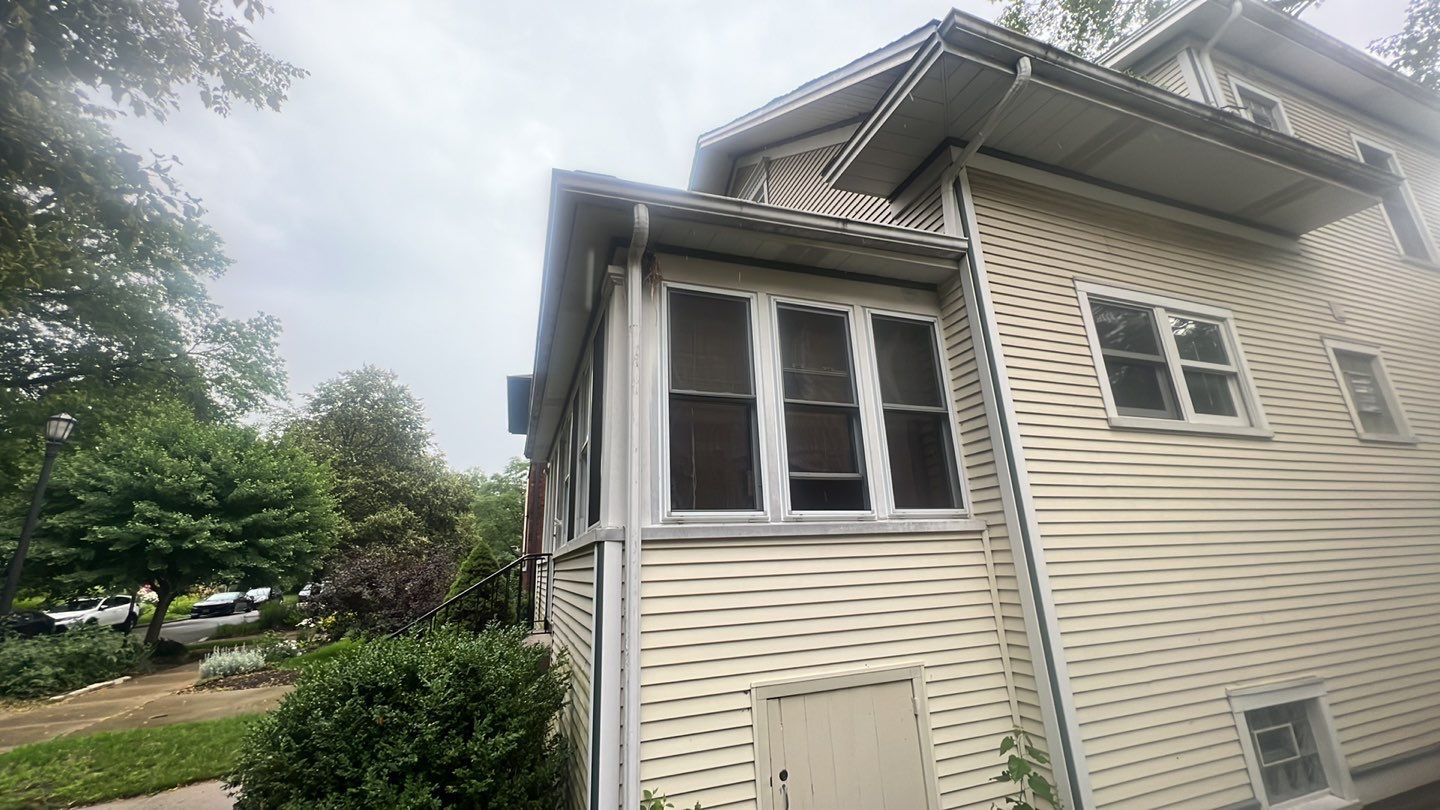 Housewashing  using Algaecide, soft wash soap by Northern Power Washing LLC.