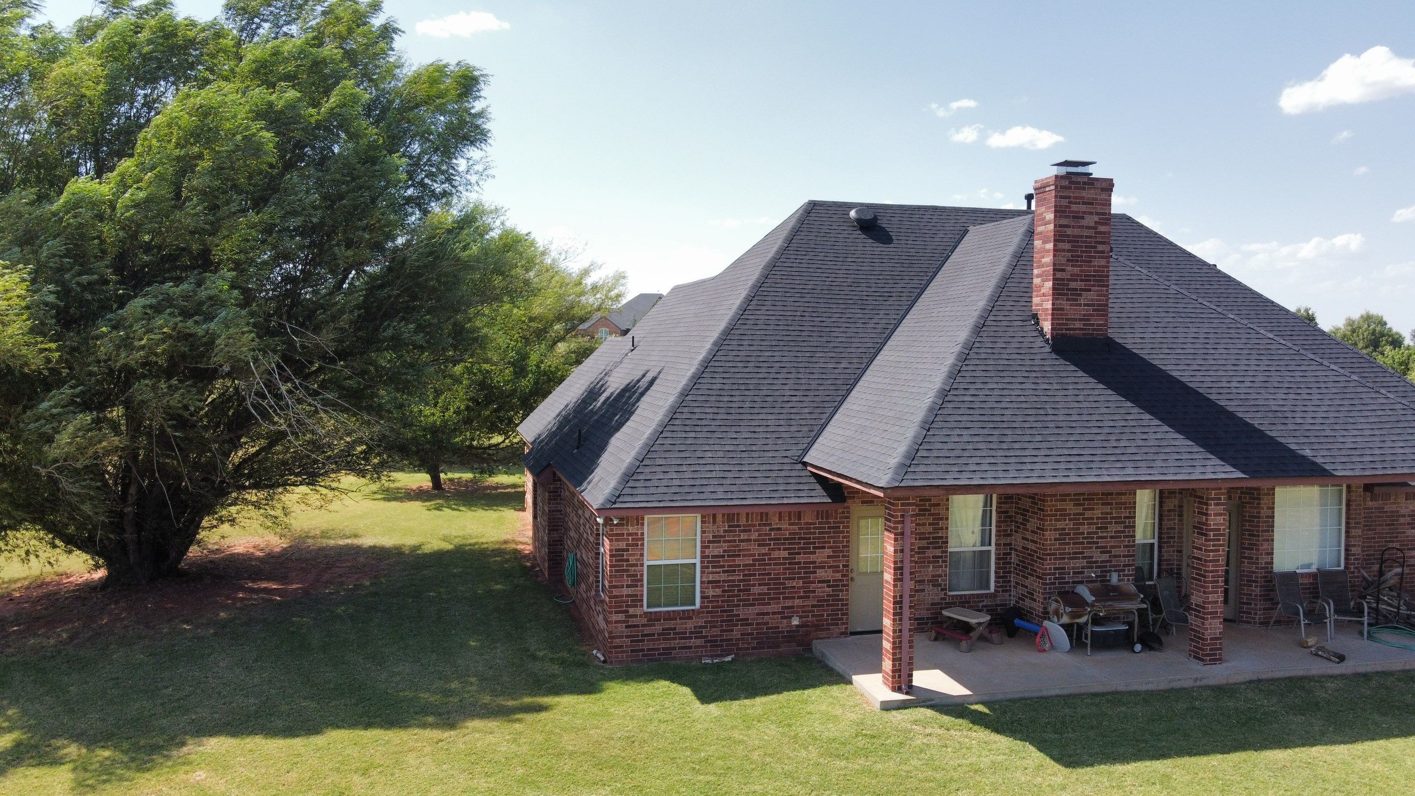 Residential Roofing Installation using GAF Natural Shadow  by A & H Roofing and Contracting