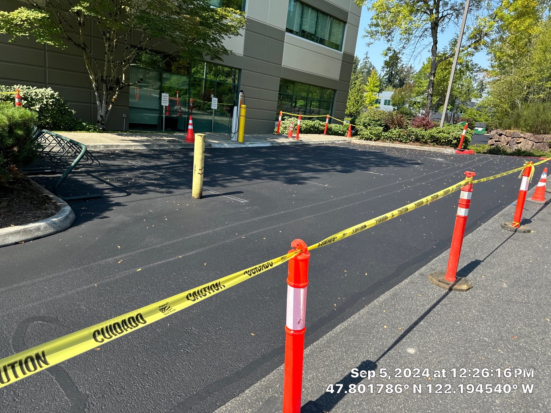 Kidder Matthews | Parking Lot Sealcoating & Striping with Concrete Curb & Patch Repairs  by Jireh Asphalt & Concrete Inc 