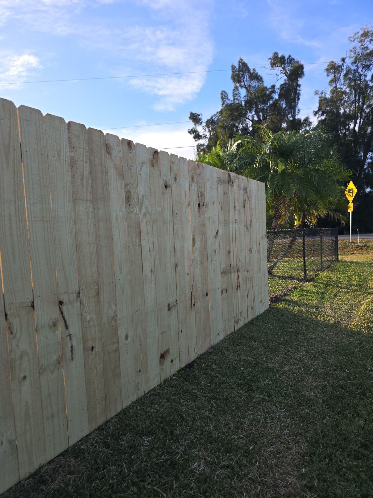 Wood and Chain Link Fence in Port Charlotte by True Fence LLC