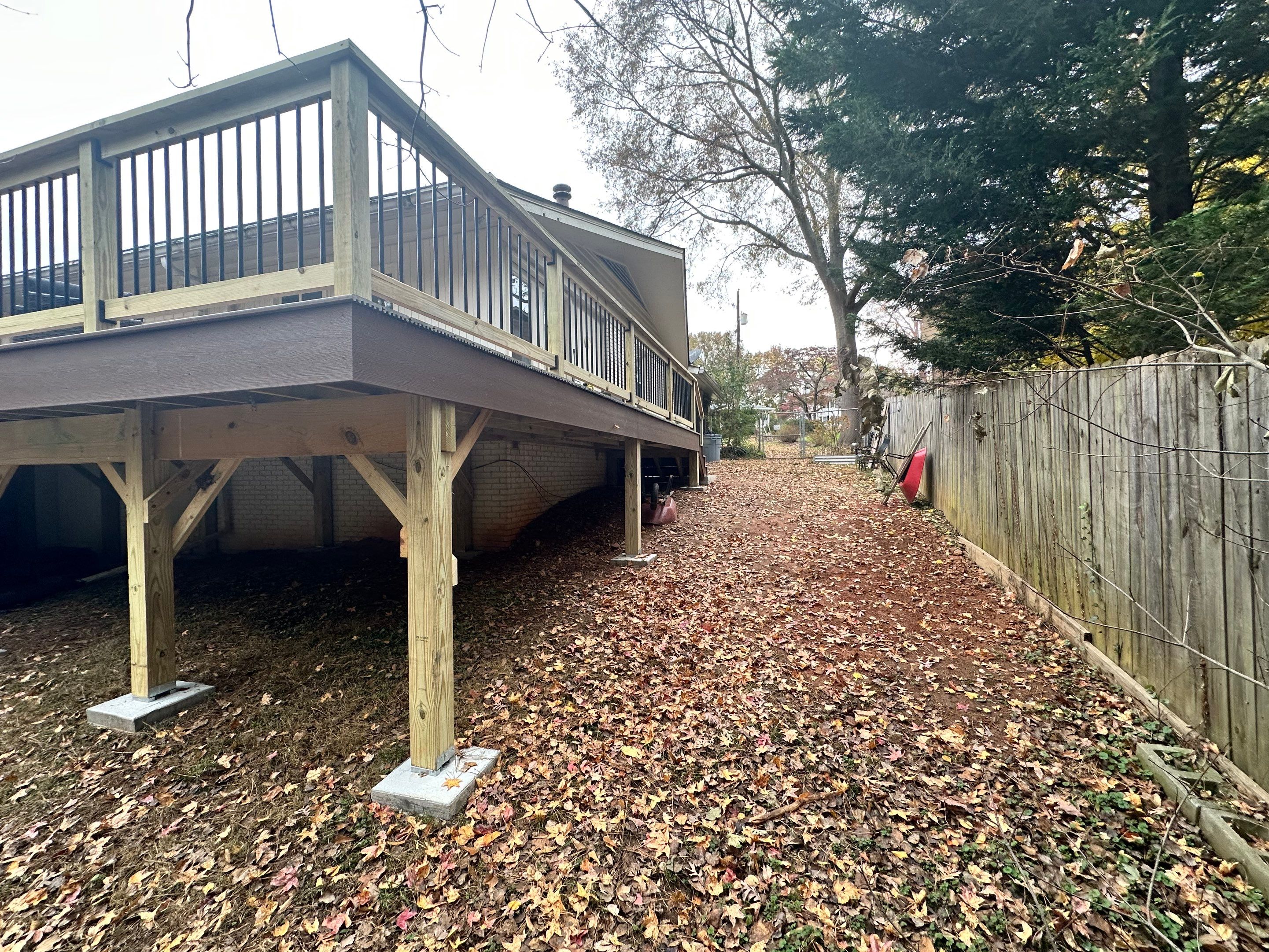 Elevated Composite Deck Rebuild With Metal Balusters in Marietta by Swift Home Renovations