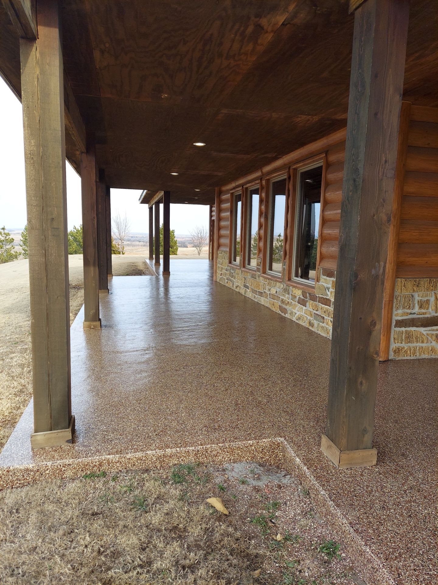 Patio Coating Installation with Chestnut by Copperhead Coatings