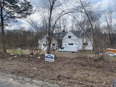 Residential Roofing Installation using Owens Corning TruDefinition Duration AR - Estate Gray & White Double 4 Siding