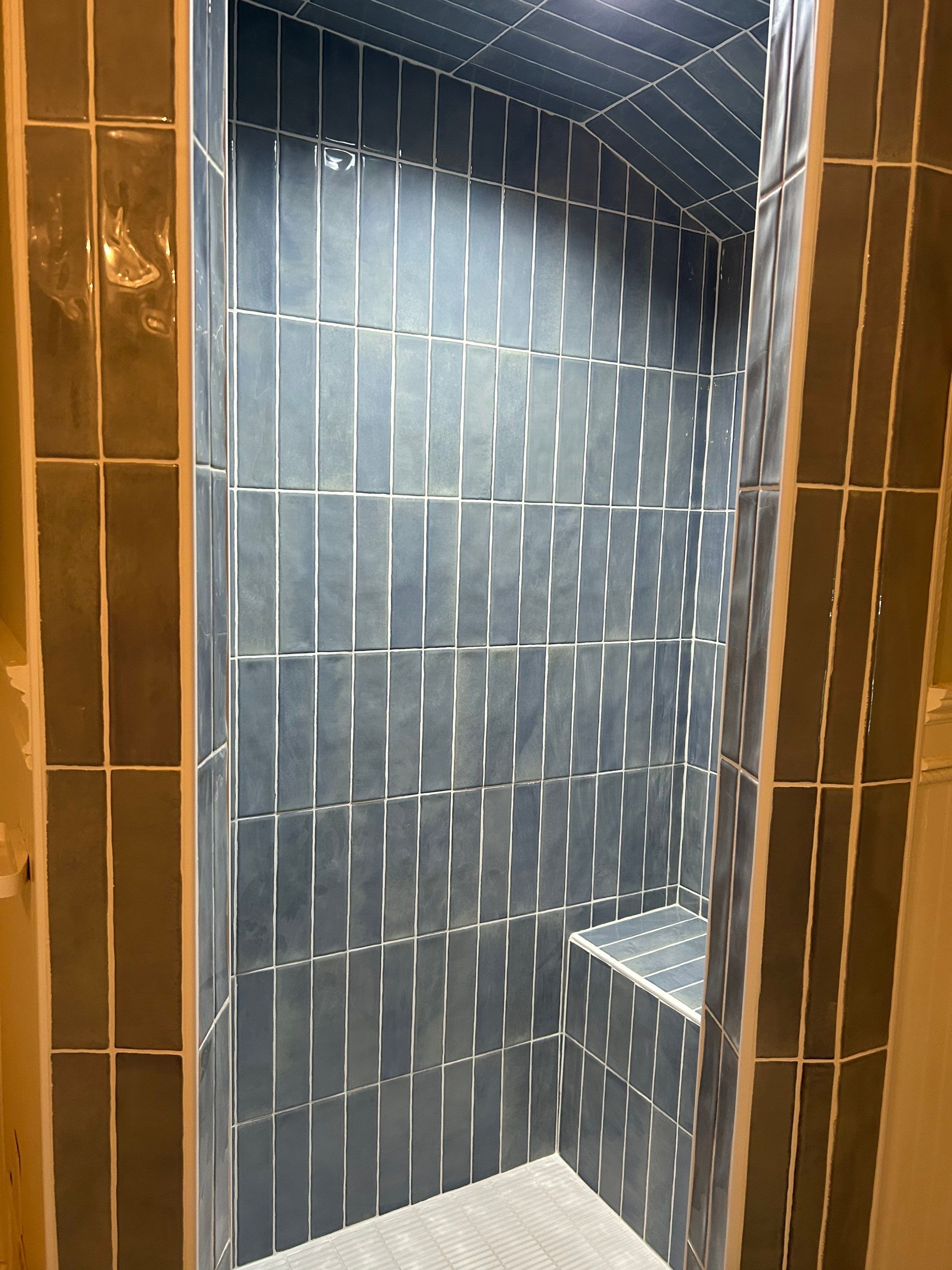 Tile shower and floor by Footprints Floors of Nashville